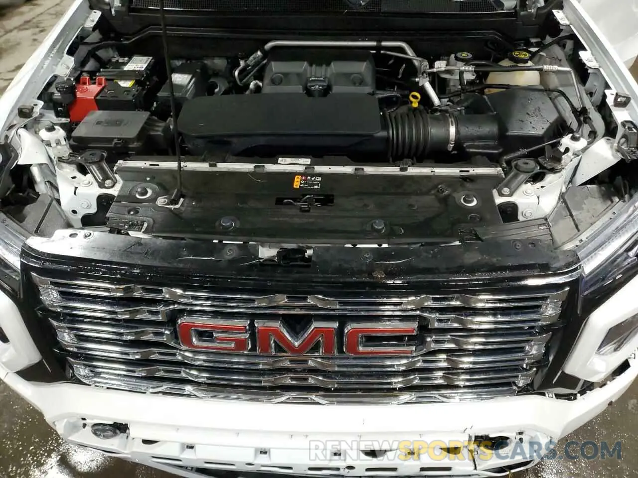 12 Photograph of a damaged car 1GTP6FEK5P1179814 GMC CANYON 2023