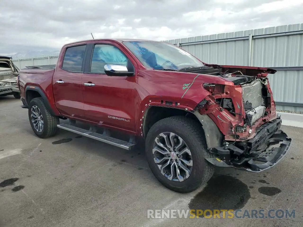 4 Photograph of a damaged car 1GTP6FEK7P1128105 GMC CANYON 2023