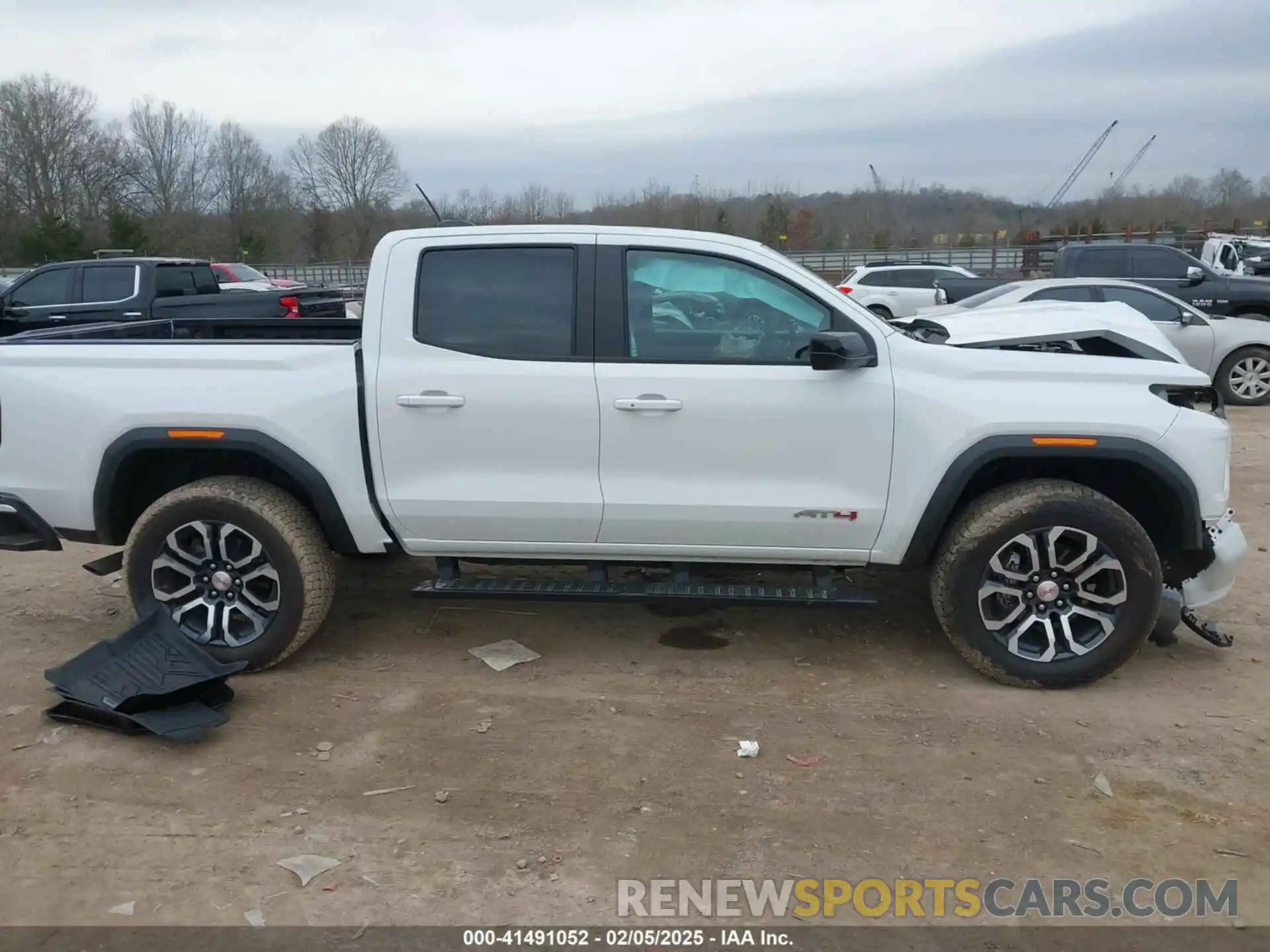 13 Photograph of a damaged car 1GTP6DEK1R1230068 GMC CANYON 2024