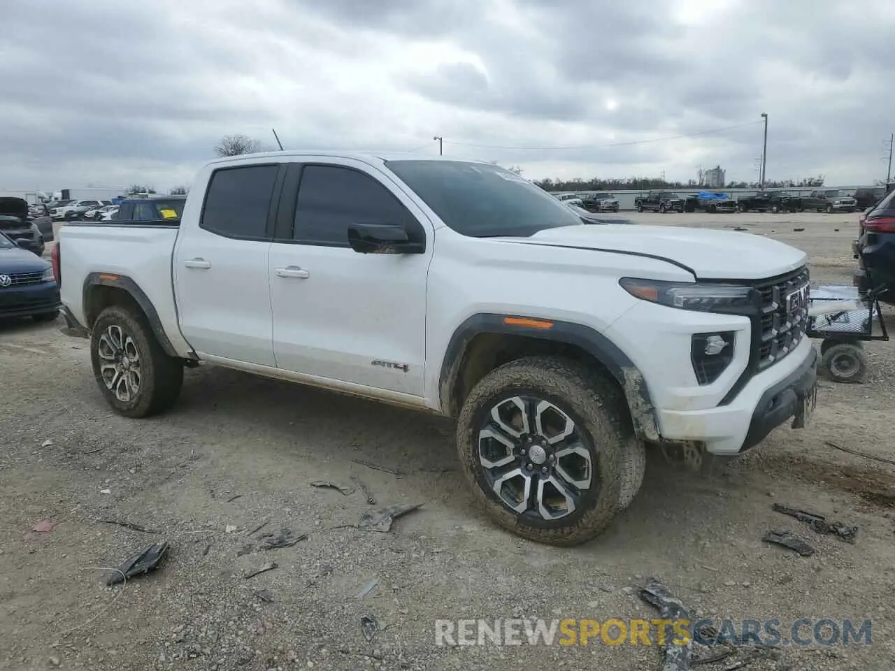 4 Photograph of a damaged car 1GTP6DEK2R1177610 GMC CANYON 2024