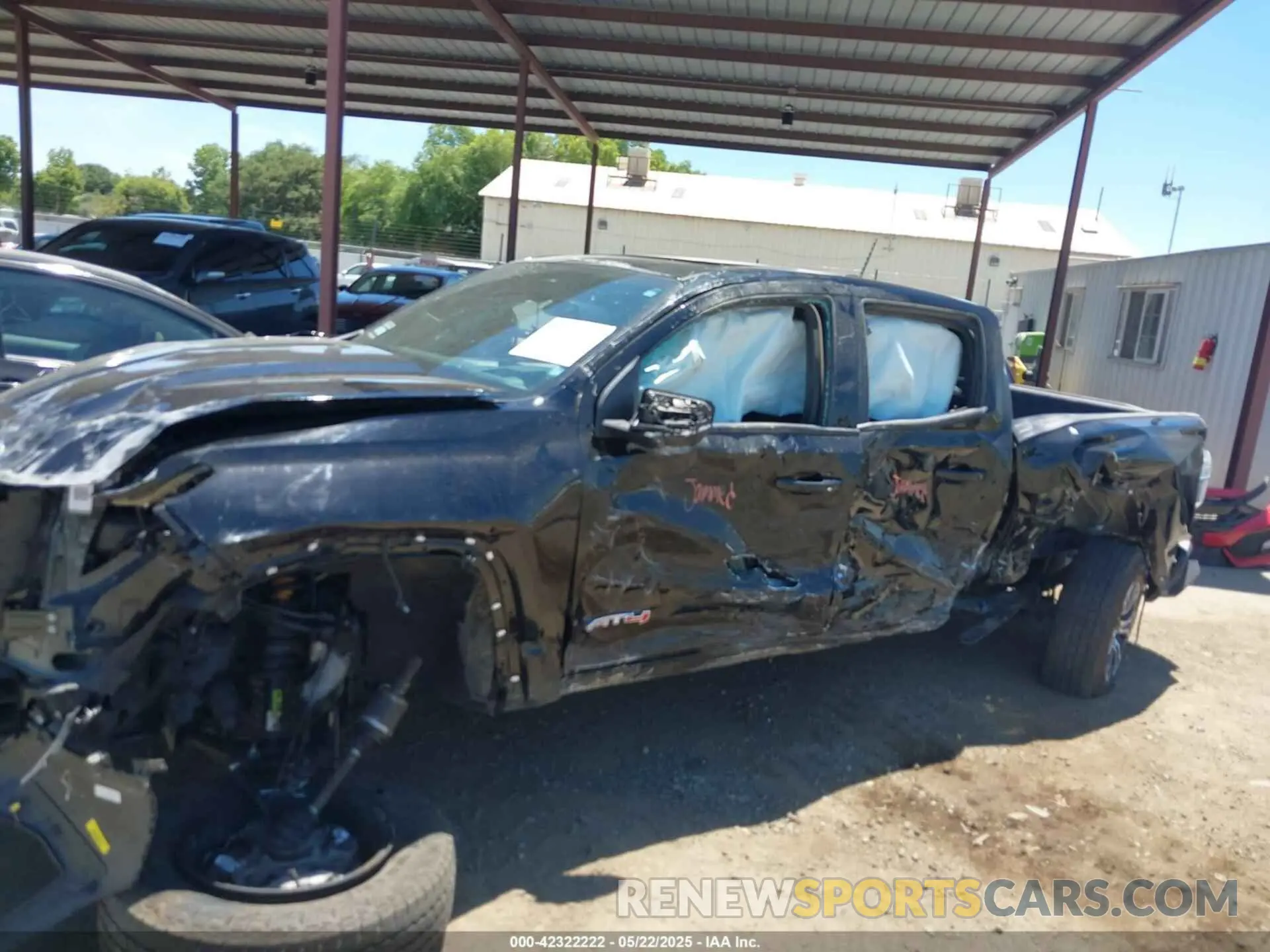14 Photograph of a damaged car 1GTP6DEKXR1155905 GMC CANYON 2024