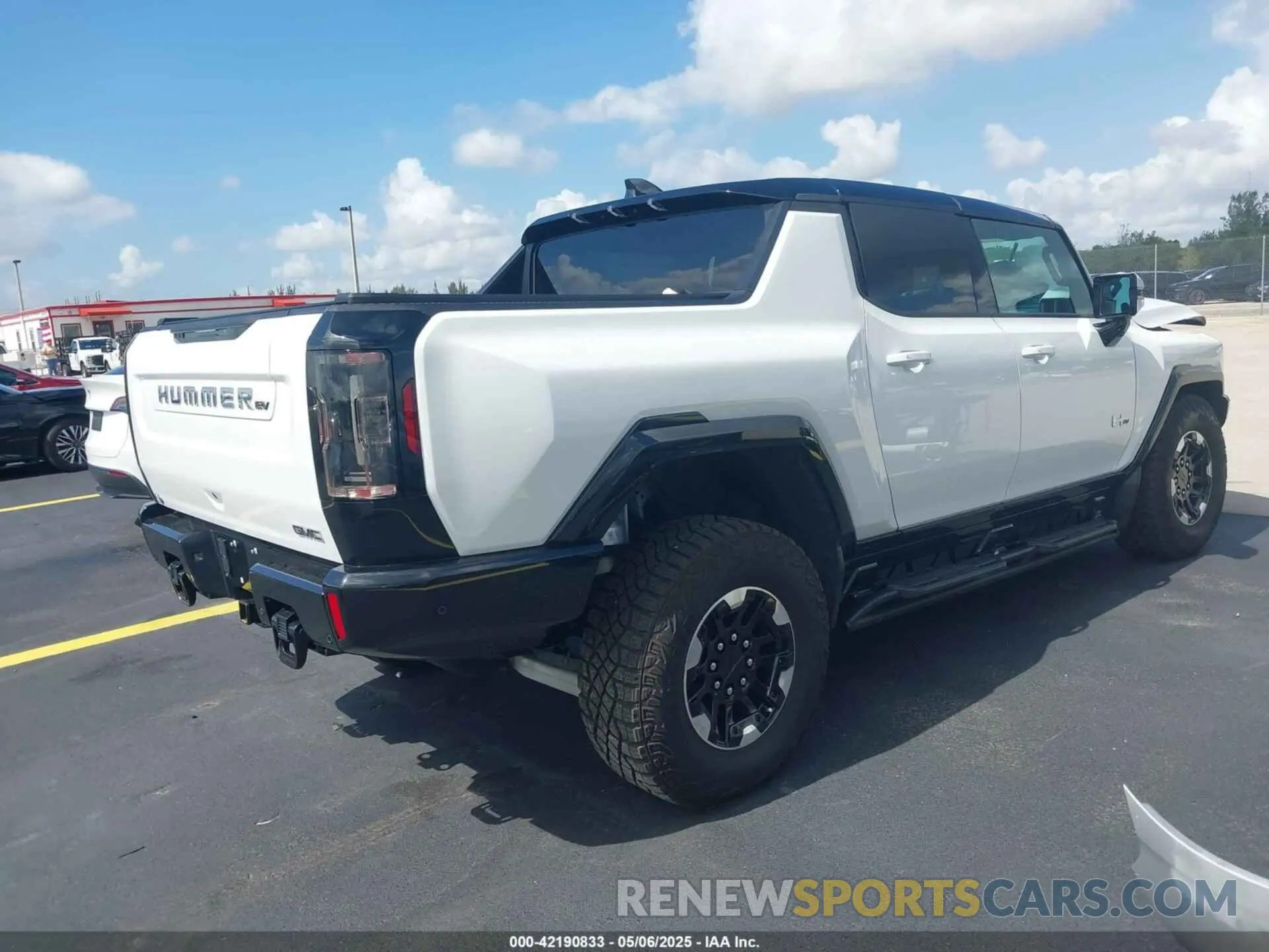 4 Photograph of a damaged car 1GT40FDA2NU101127 GMC HUMMER EV PICKUP 2022