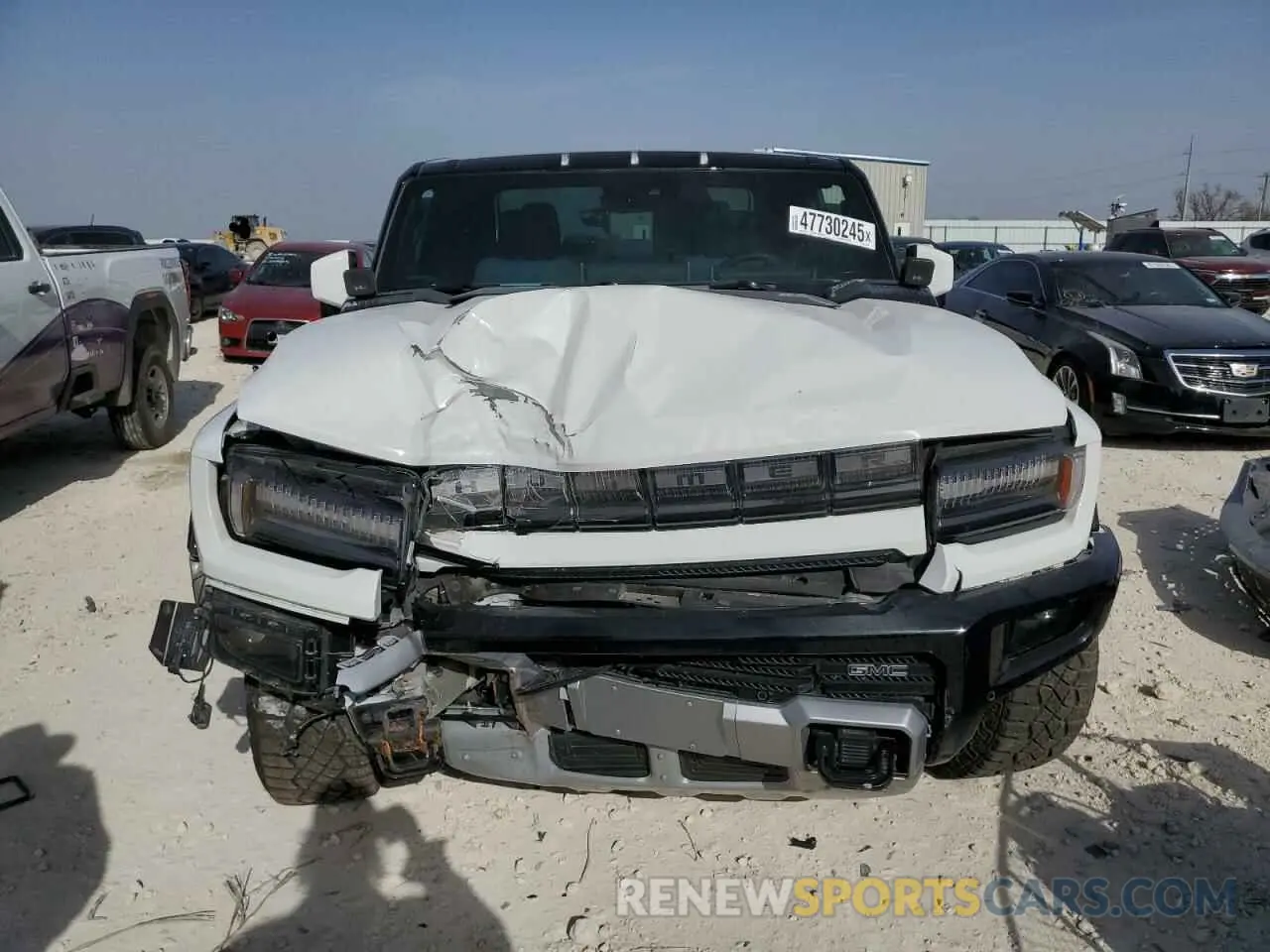 5 Photograph of a damaged car 1GT40FDA9PU100320 GMC HUMMER PIC 2023