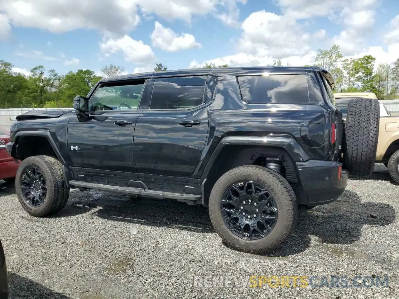 2 Photograph of a damaged car 1GKB0NDE0RU109550 GMC HUMMER SUV 2024