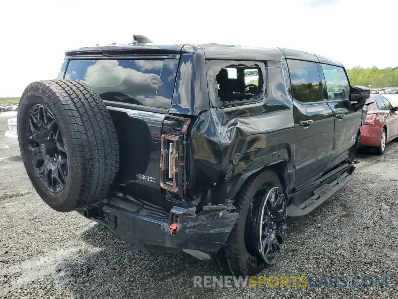 3 Photograph of a damaged car 1GKB0NDE0RU109550 GMC HUMMER SUV 2024