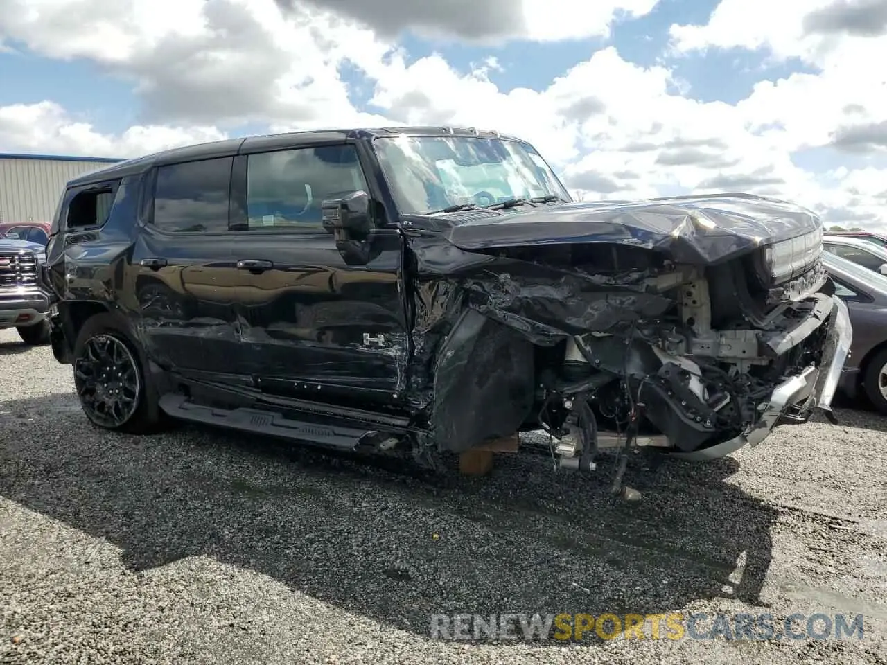 4 Photograph of a damaged car 1GKB0NDE0RU109550 GMC HUMMER SUV 2024