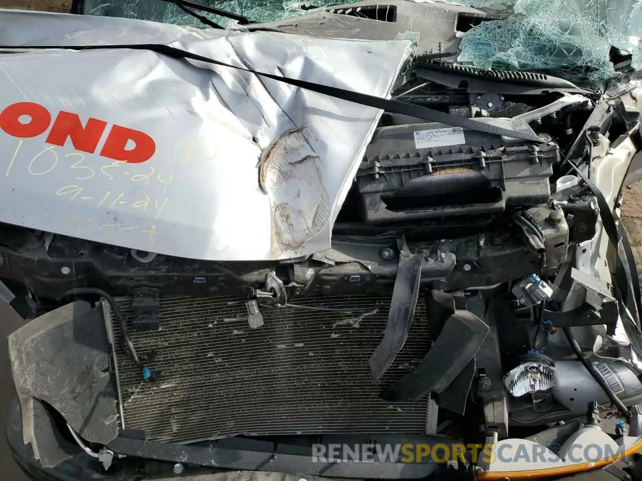 12 Photograph of a damaged car 1GTW7AFP2P1110553 GMC SAVANA 2023