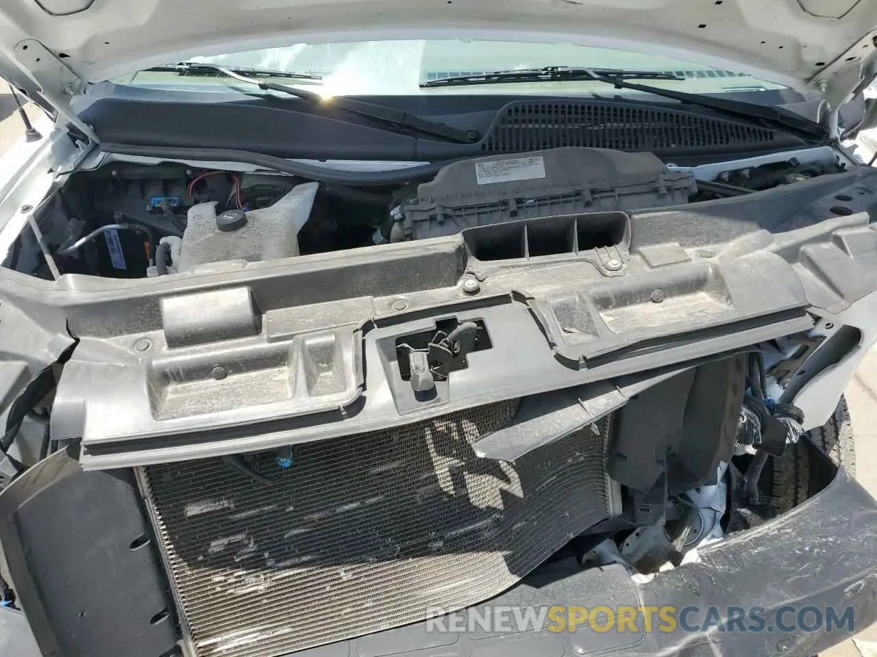 12 Photograph of a damaged car 1GTW7BFPXP1105624 GMC SAVANA 2023