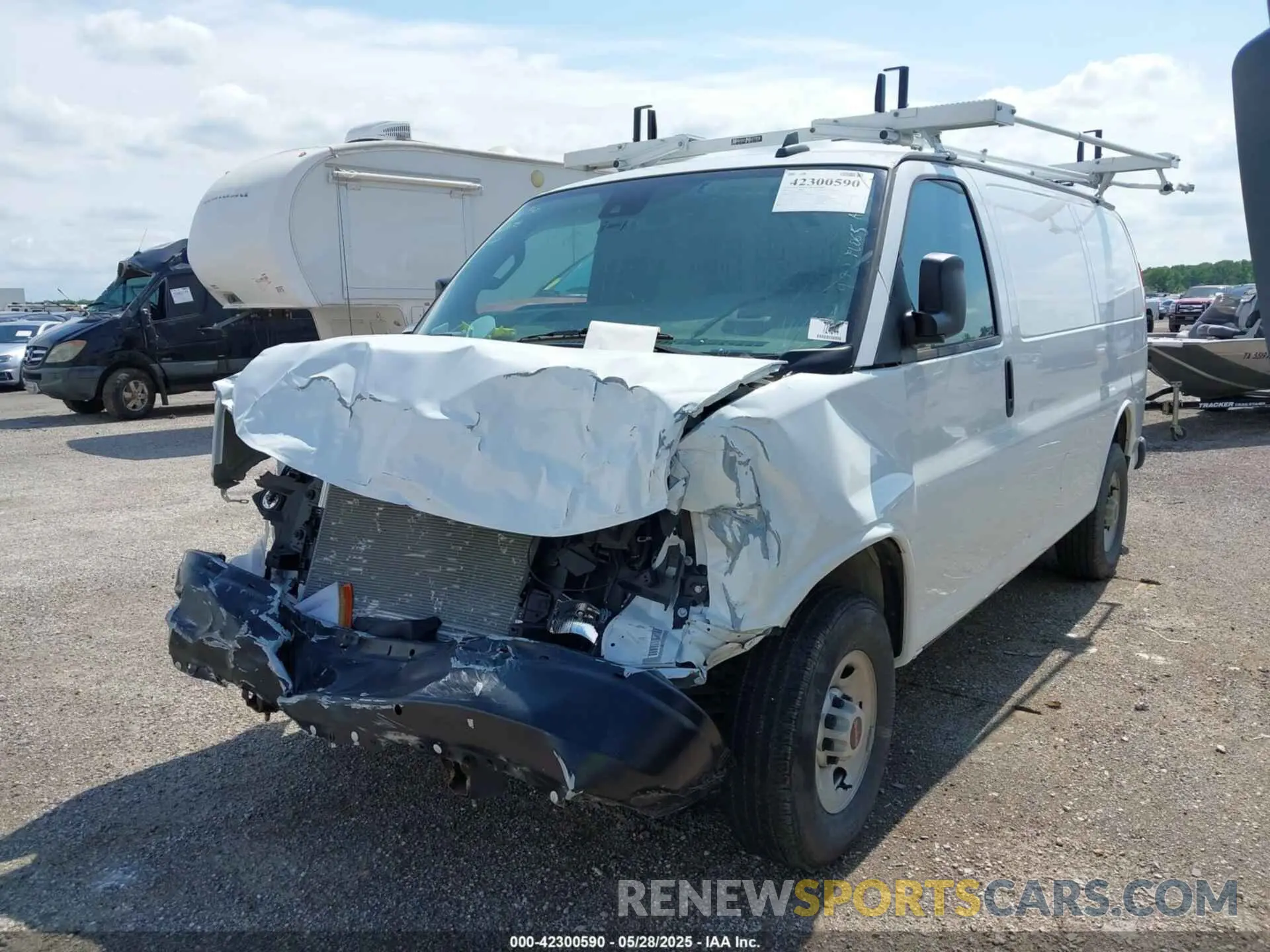 2 Photograph of a damaged car 1GTW7AFP9P1152928 GMC SAVANA CARGO 2023