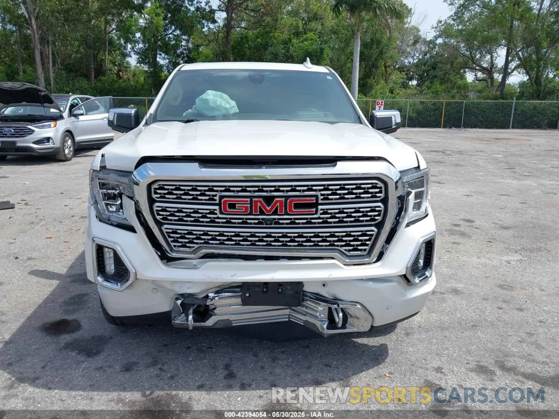 12 Photograph of a damaged car 1GTU9FEL7KZ349426 GMC SIERRA 1500 2019