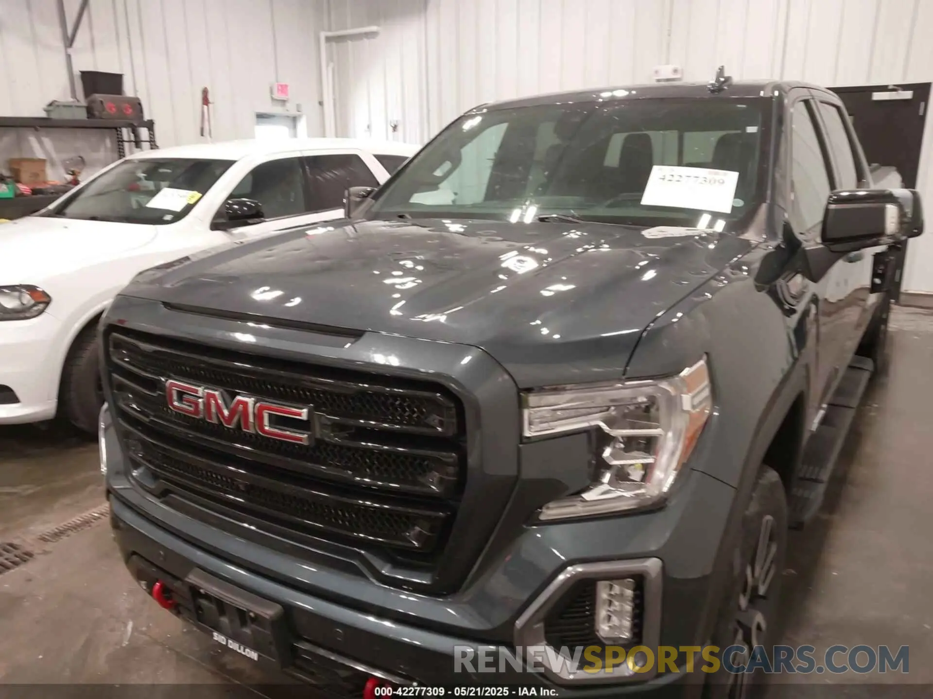 6 Photograph of a damaged car 1GTP9EEL9LZ133098 GMC SIERRA 1500 2020