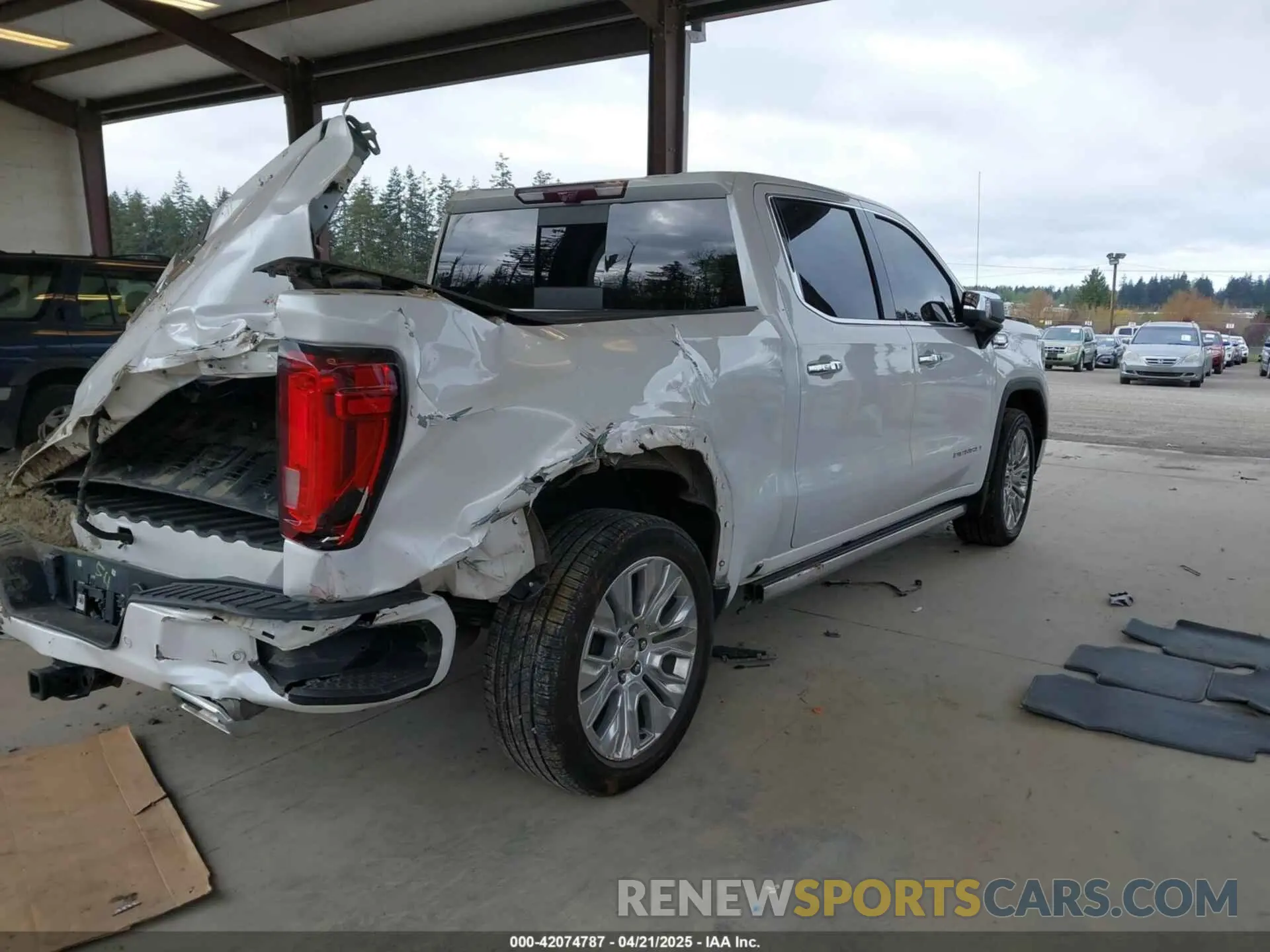 4 Photograph of a damaged car 1GTU9FET2MZ113768 GMC SIERRA 1500 2021