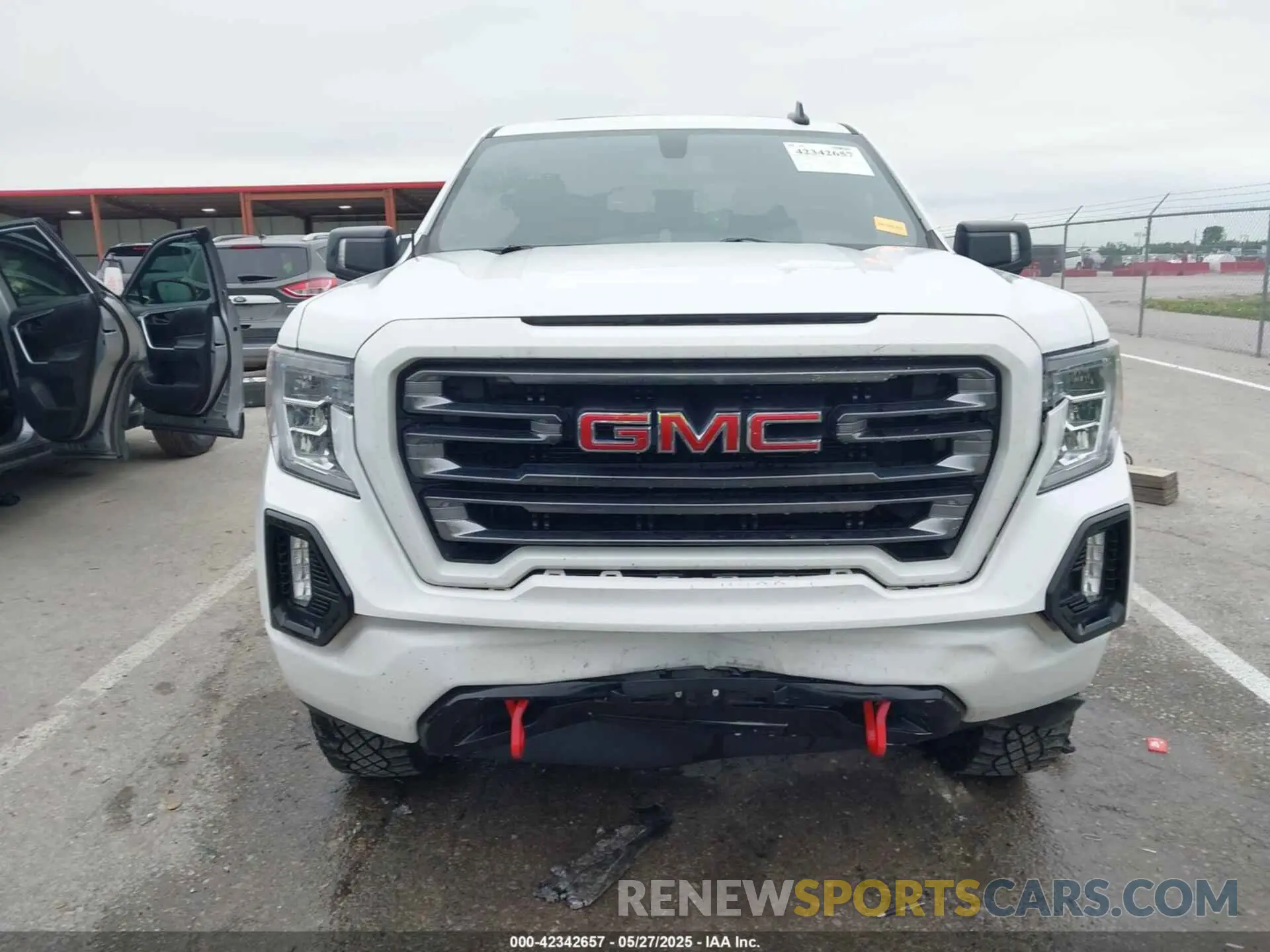 12 Photograph of a damaged car 3GTP9EED4MG390227 GMC SIERRA 1500 2021