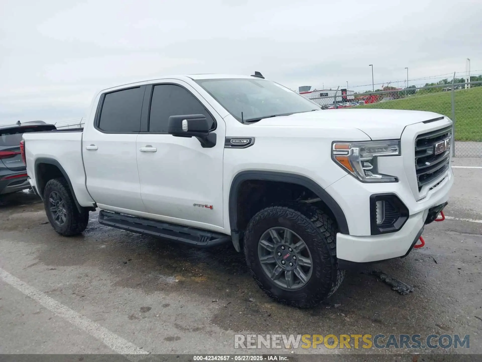 13 Photograph of a damaged car 3GTP9EED4MG390227 GMC SIERRA 1500 2021