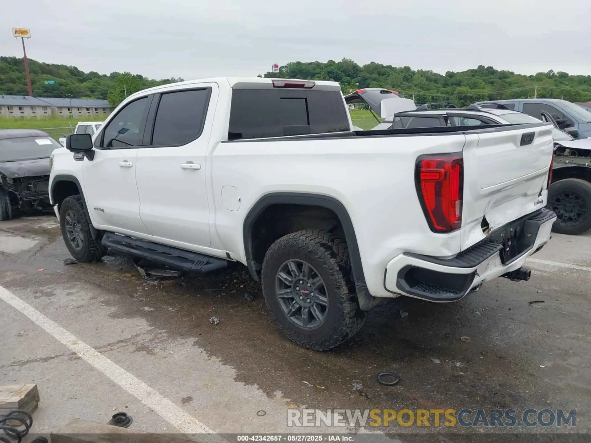 3 Photograph of a damaged car 3GTP9EED4MG390227 GMC SIERRA 1500 2021