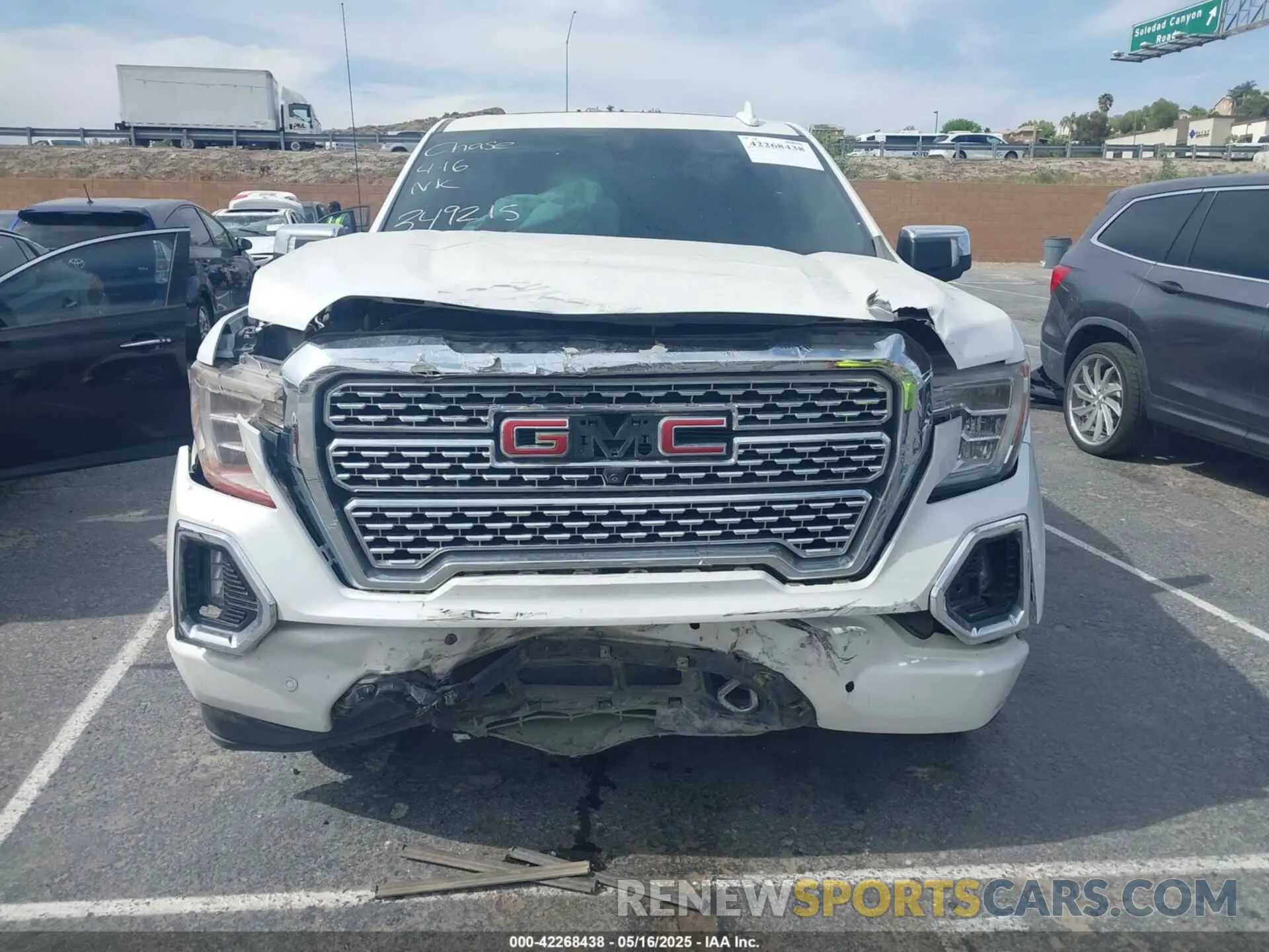 12 Photograph of a damaged car 3GTU9FEL1MG349215 GMC SIERRA 1500 2021