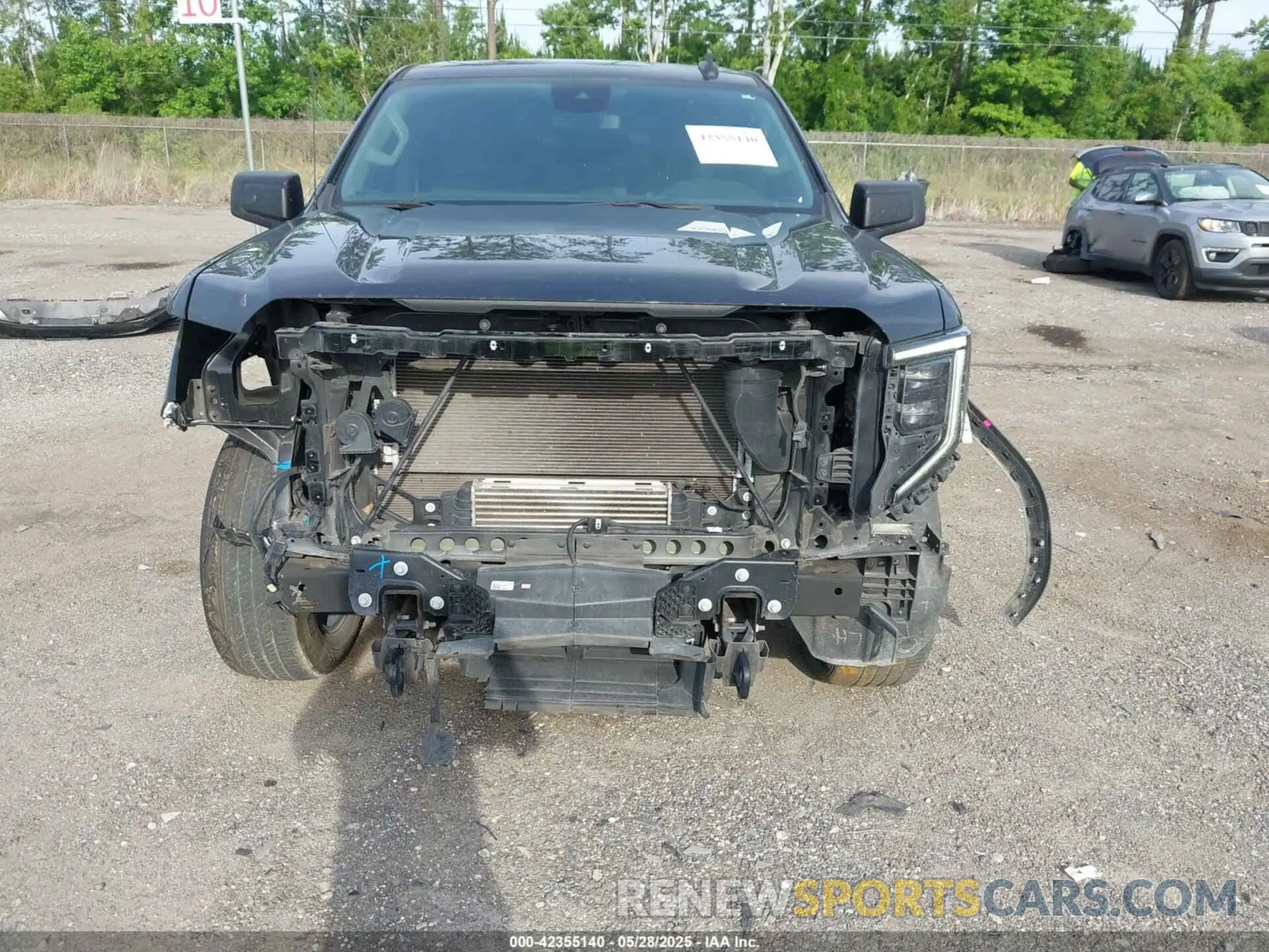 6 Photograph of a damaged car 3GTPUCEK1NG544010 GMC SIERRA 1500 2022