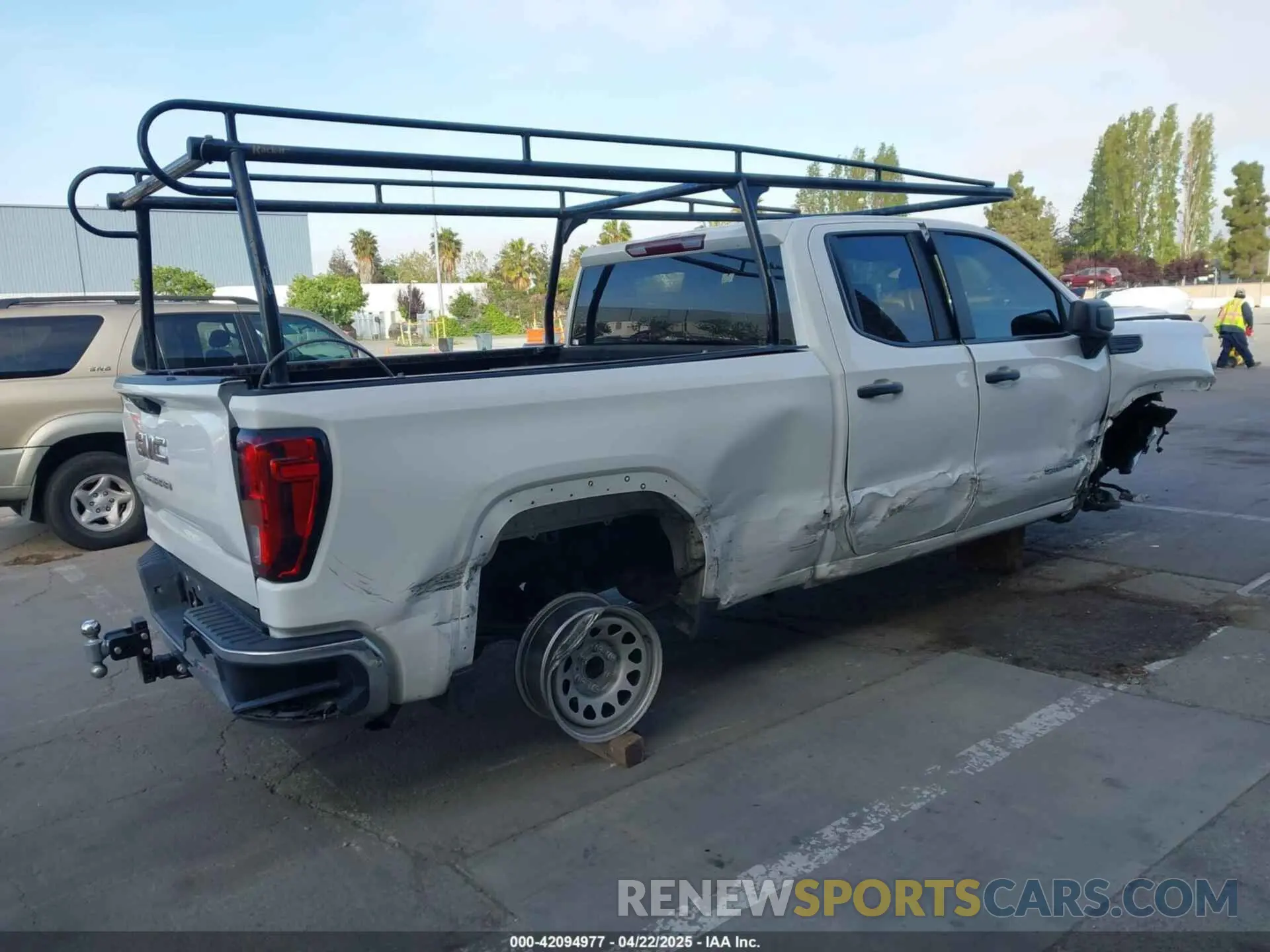 4 Photograph of a damaged car 1GTRHAED9PZ273476 GMC SIERRA 1500 2023