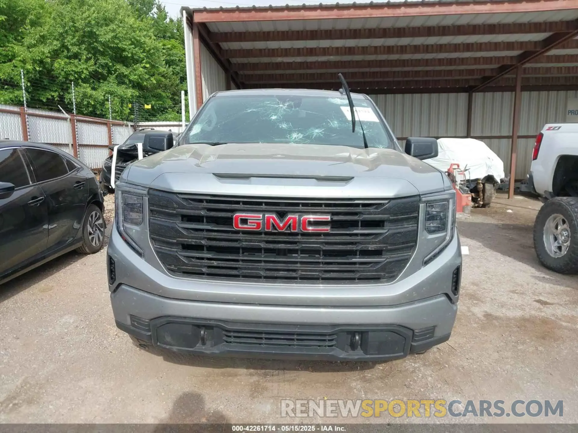 12 Photograph of a damaged car 1GTRHAEK1PZ265385 GMC SIERRA 1500 2023