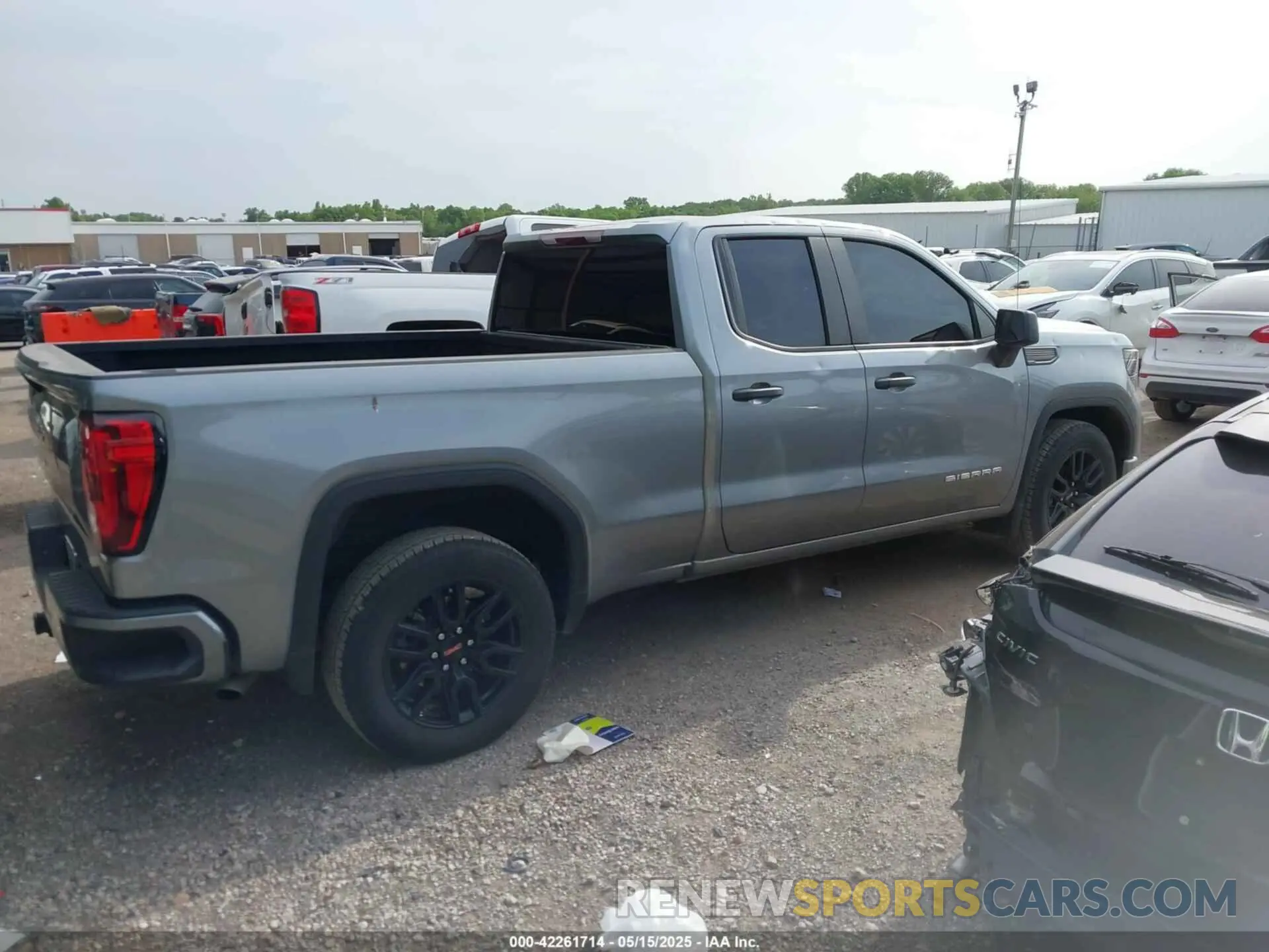 13 Photograph of a damaged car 1GTRHAEK1PZ265385 GMC SIERRA 1500 2023