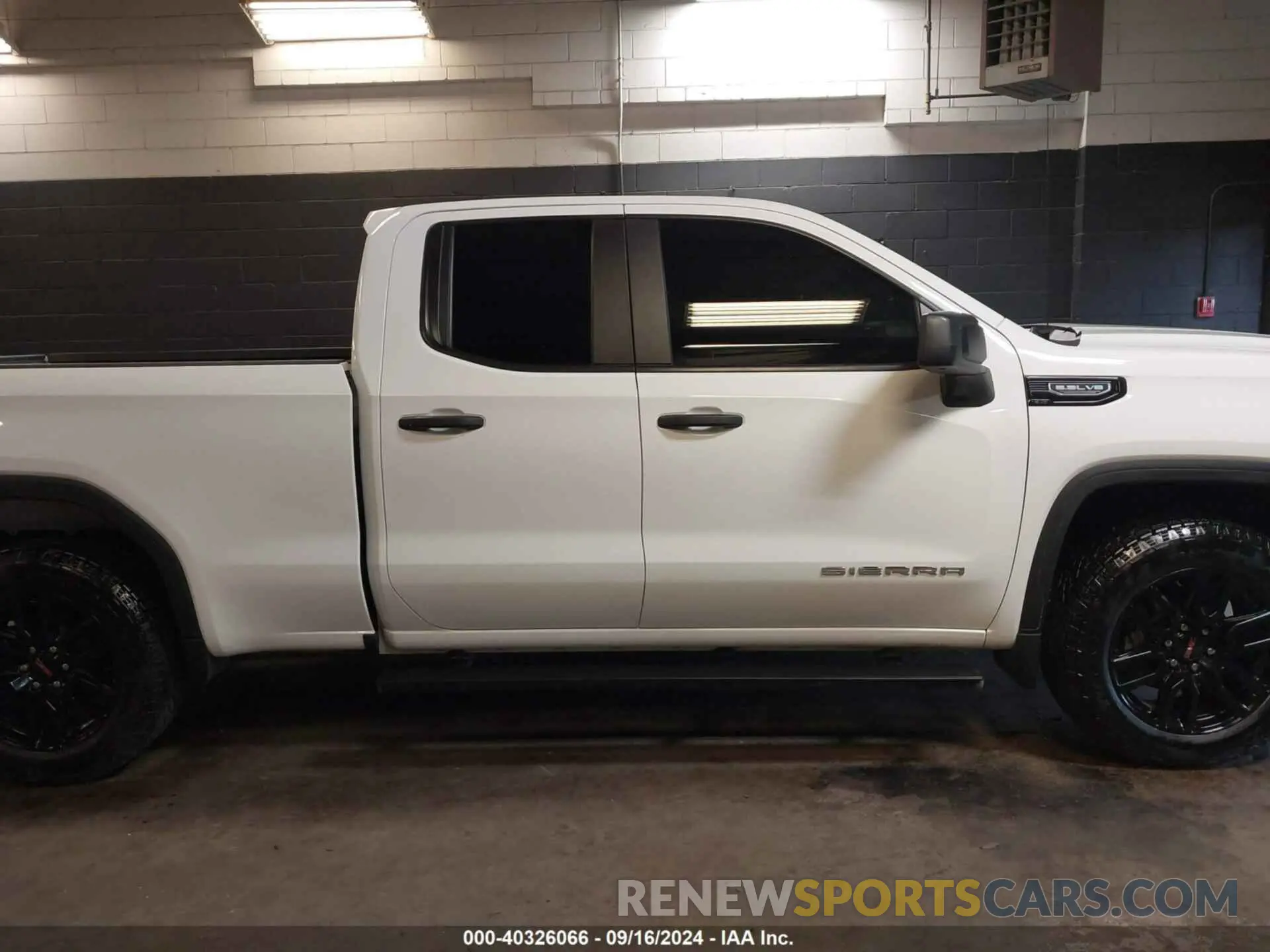 13 Photograph of a damaged car 1GTRUAED6PZ280932 GMC SIERRA 1500 2023