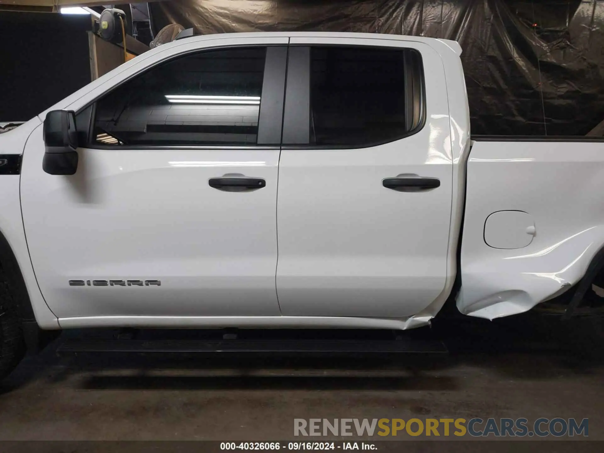 14 Photograph of a damaged car 1GTRUAED6PZ280932 GMC SIERRA 1500 2023