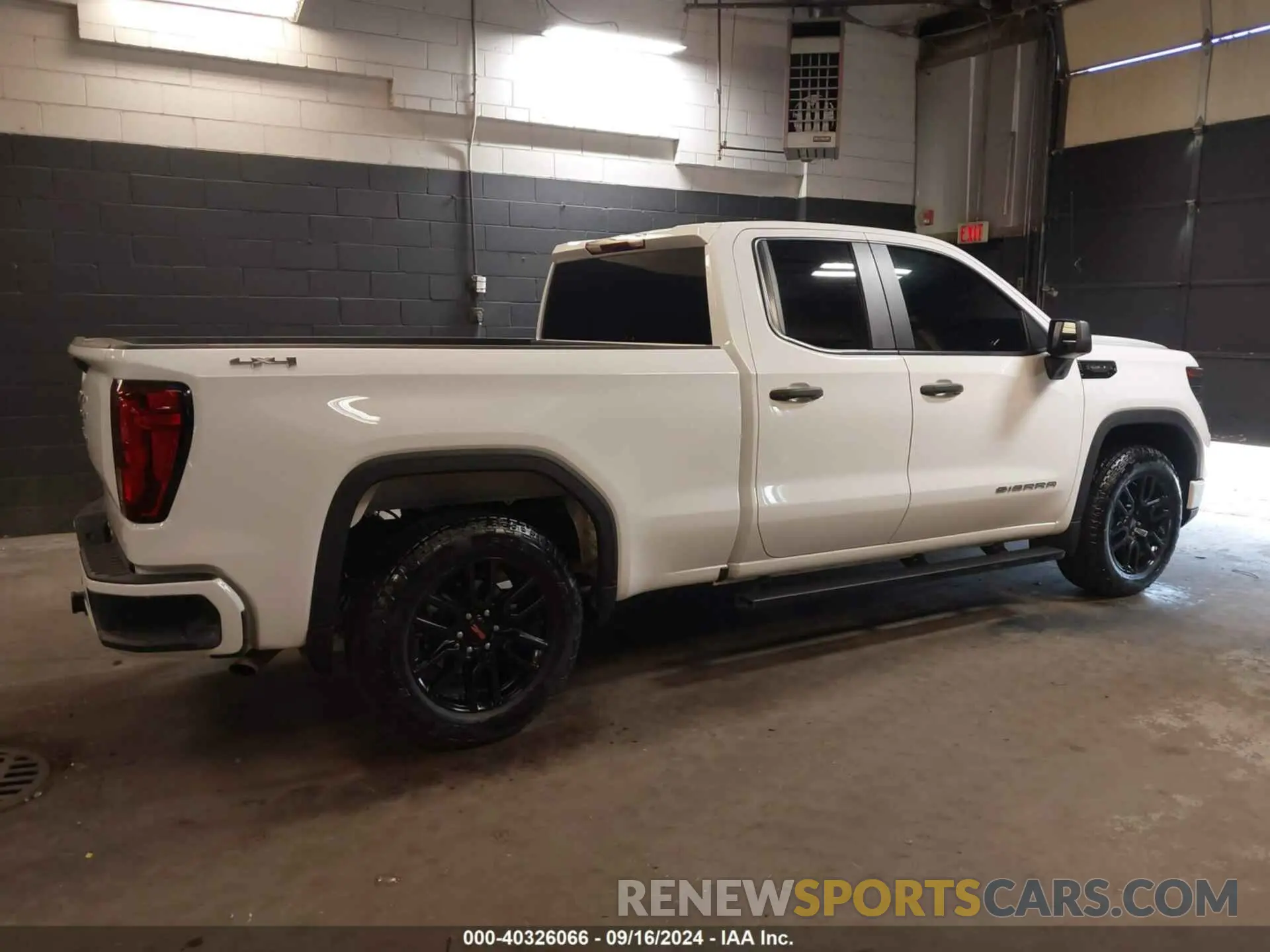 4 Photograph of a damaged car 1GTRUAED6PZ280932 GMC SIERRA 1500 2023