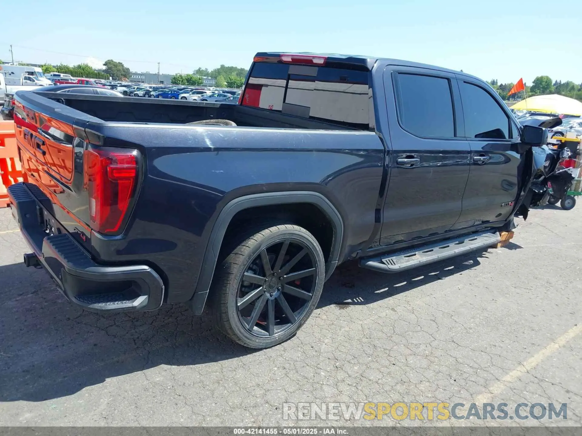 4 Photograph of a damaged car 1GTUUEE85PZ313956 GMC SIERRA 1500 2023