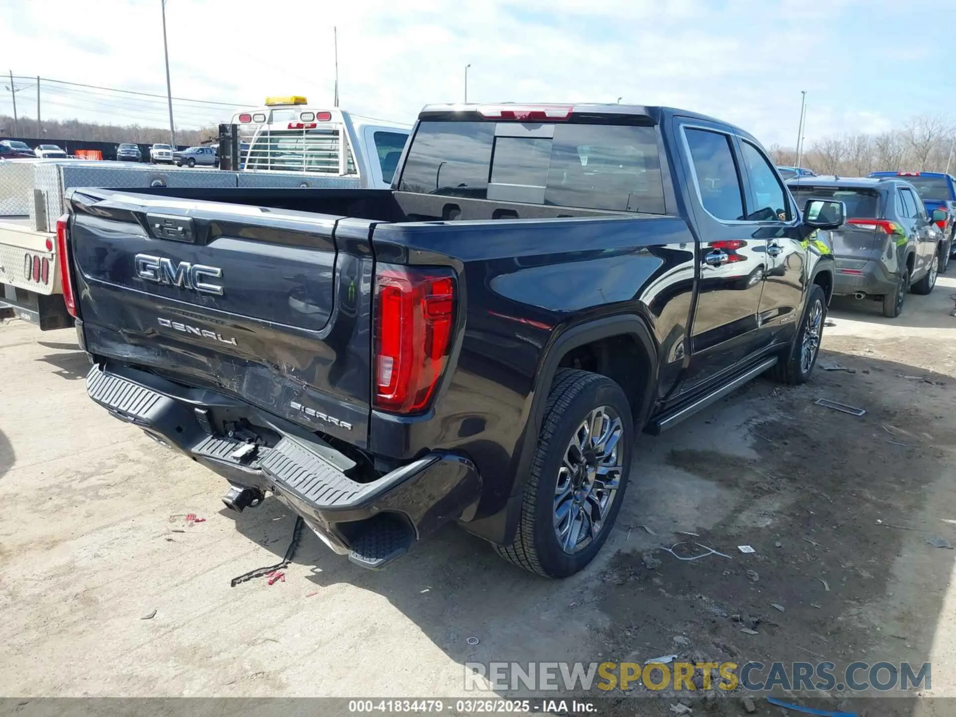 4 Photograph of a damaged car 1GTUUHE89PZ314769 GMC SIERRA 1500 2023
