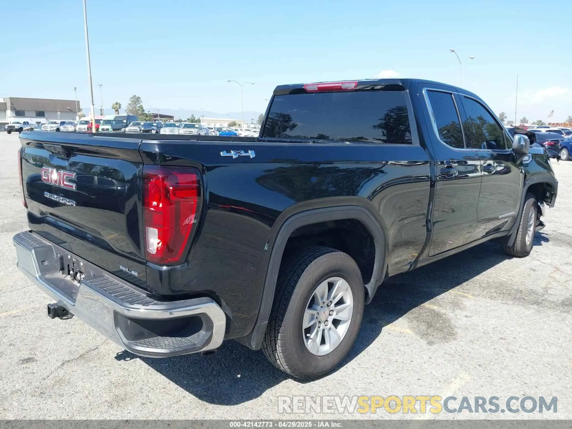 4 Photograph of a damaged car 1GTVUBE81PZ328392 GMC SIERRA 1500 2023