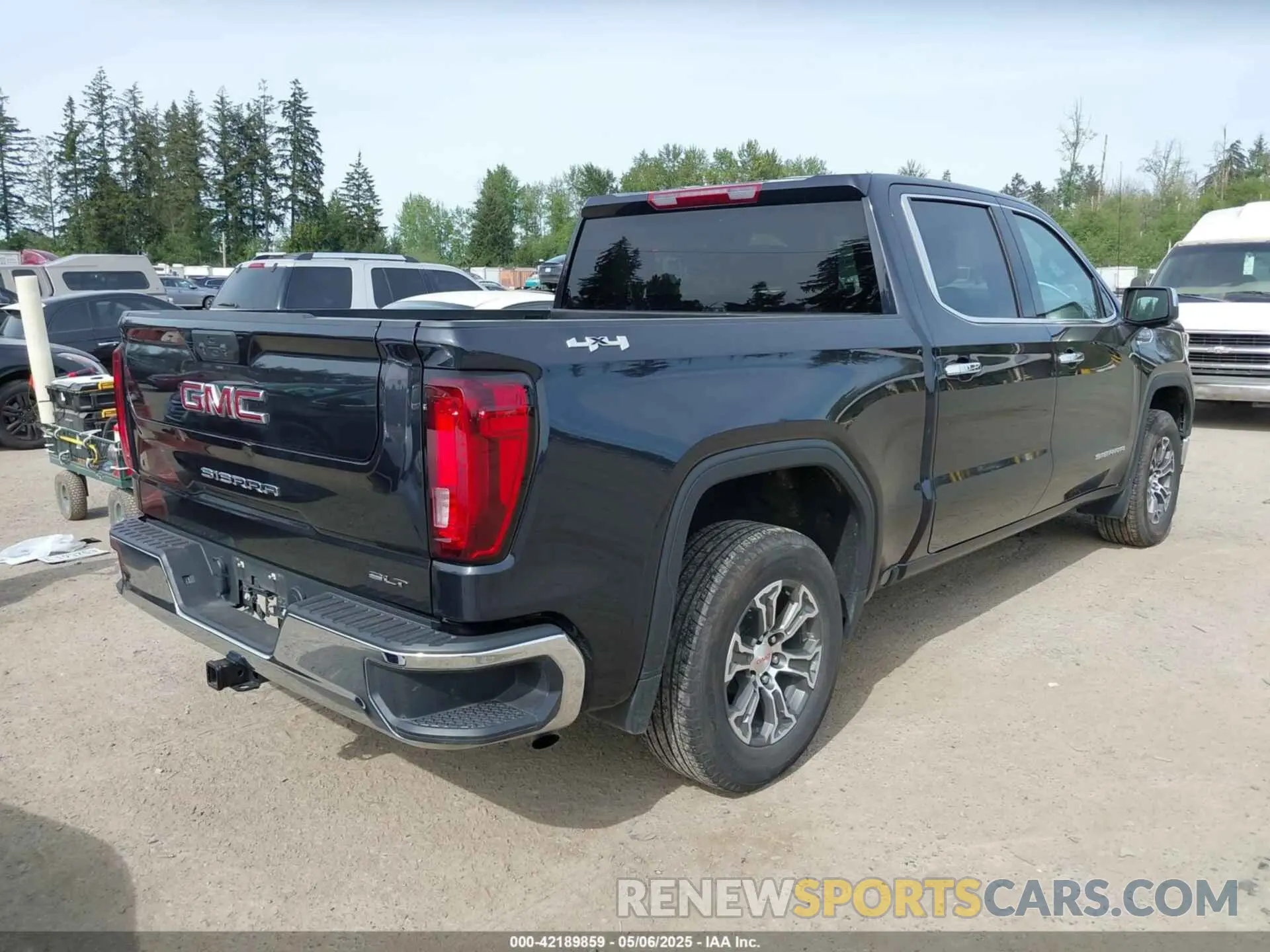 4 Photograph of a damaged car 1GTUUDED2RZ273264 GMC SIERRA 1500 2024