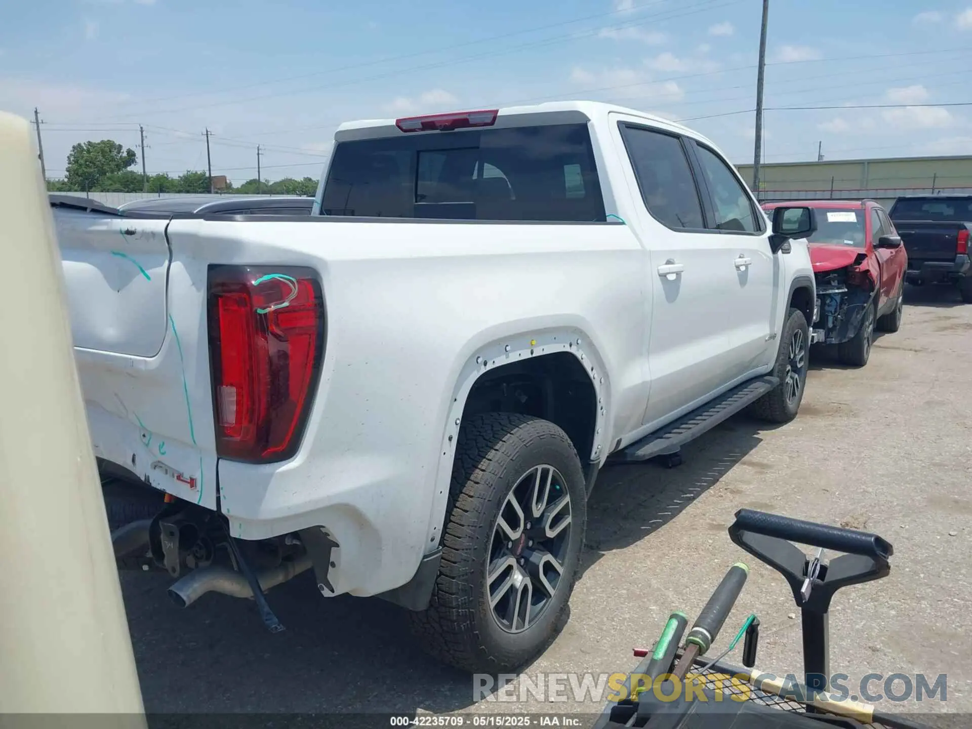 4 Photograph of a damaged car 1GTUUEE82SZ160087 GMC SIERRA 1500 2025