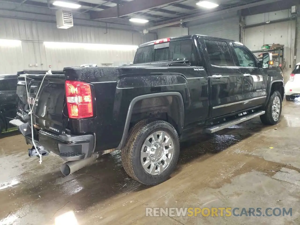 3 Photograph of a damaged car 1GT12SEY2KF219941 GMC SIERRA 2019