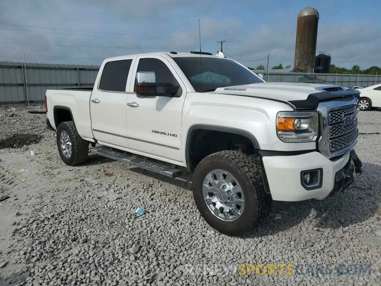 4 Photograph of a damaged car 1GT12SEY6KF184336 GMC SIERRA 2019
