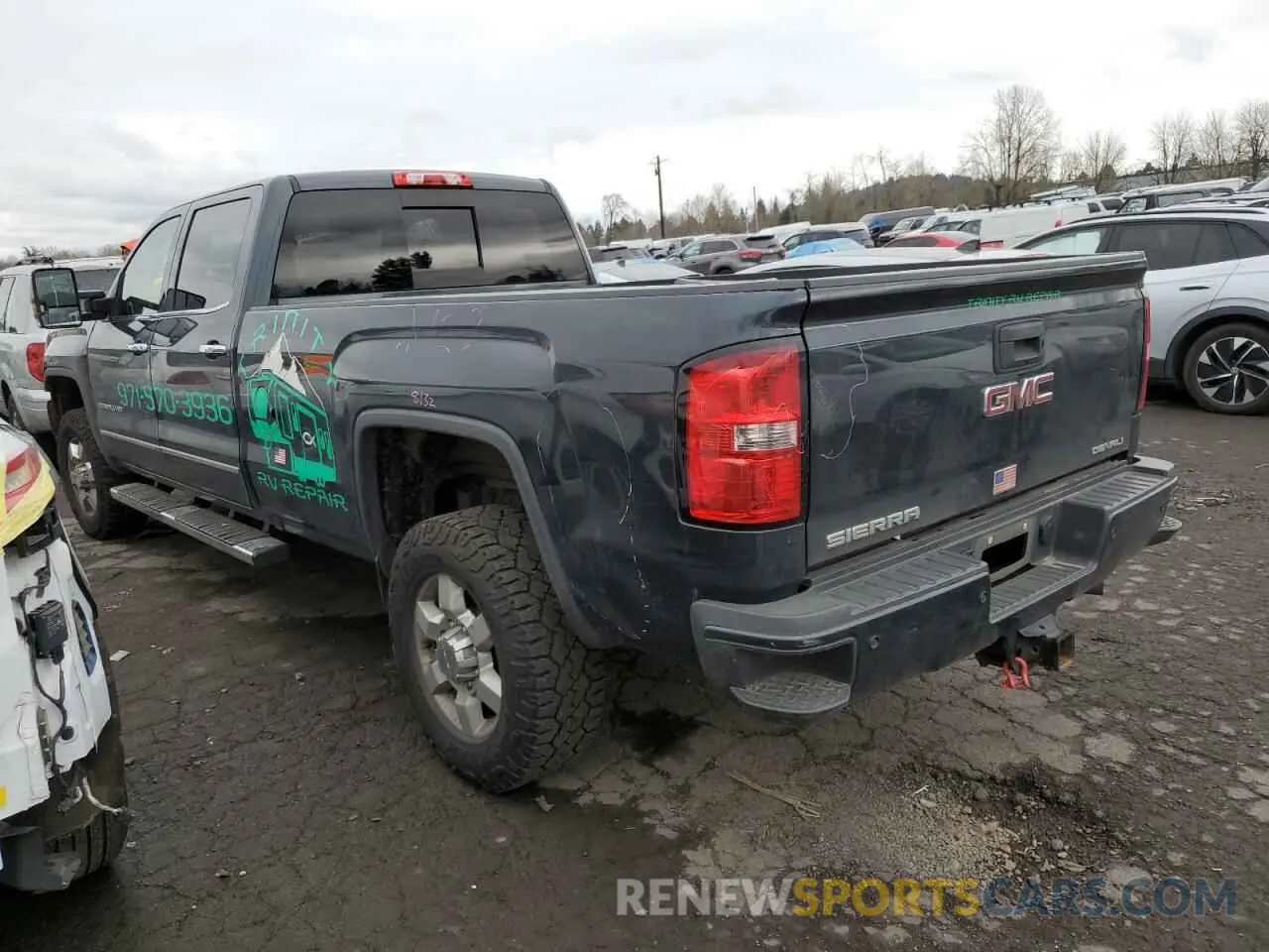 2 Photograph of a damaged car 1GT42WEY2KF249008 GMC SIERRA 2019
