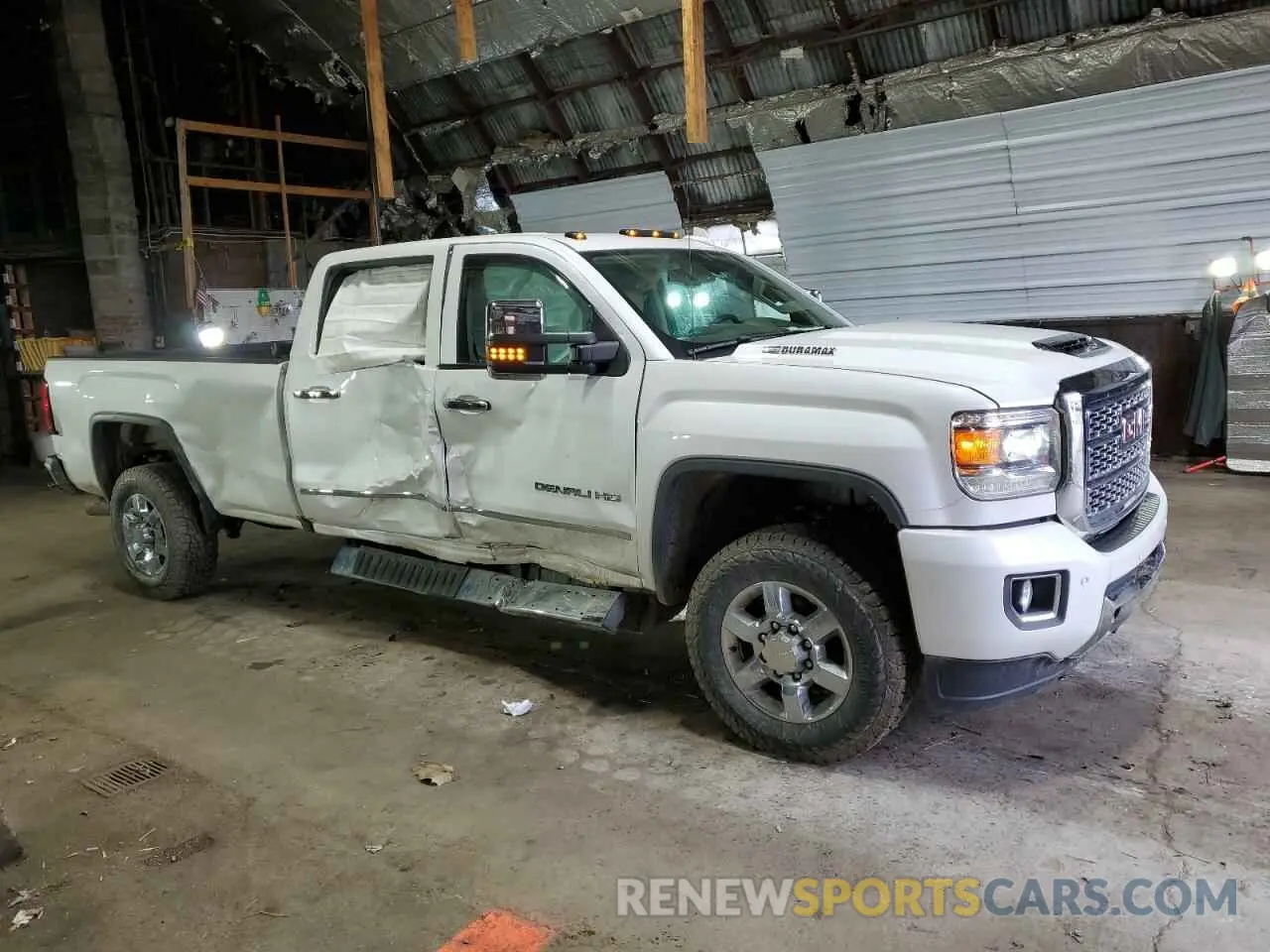 4 Photograph of a damaged car 1GT42WEY6KF250694 GMC SIERRA 2019
