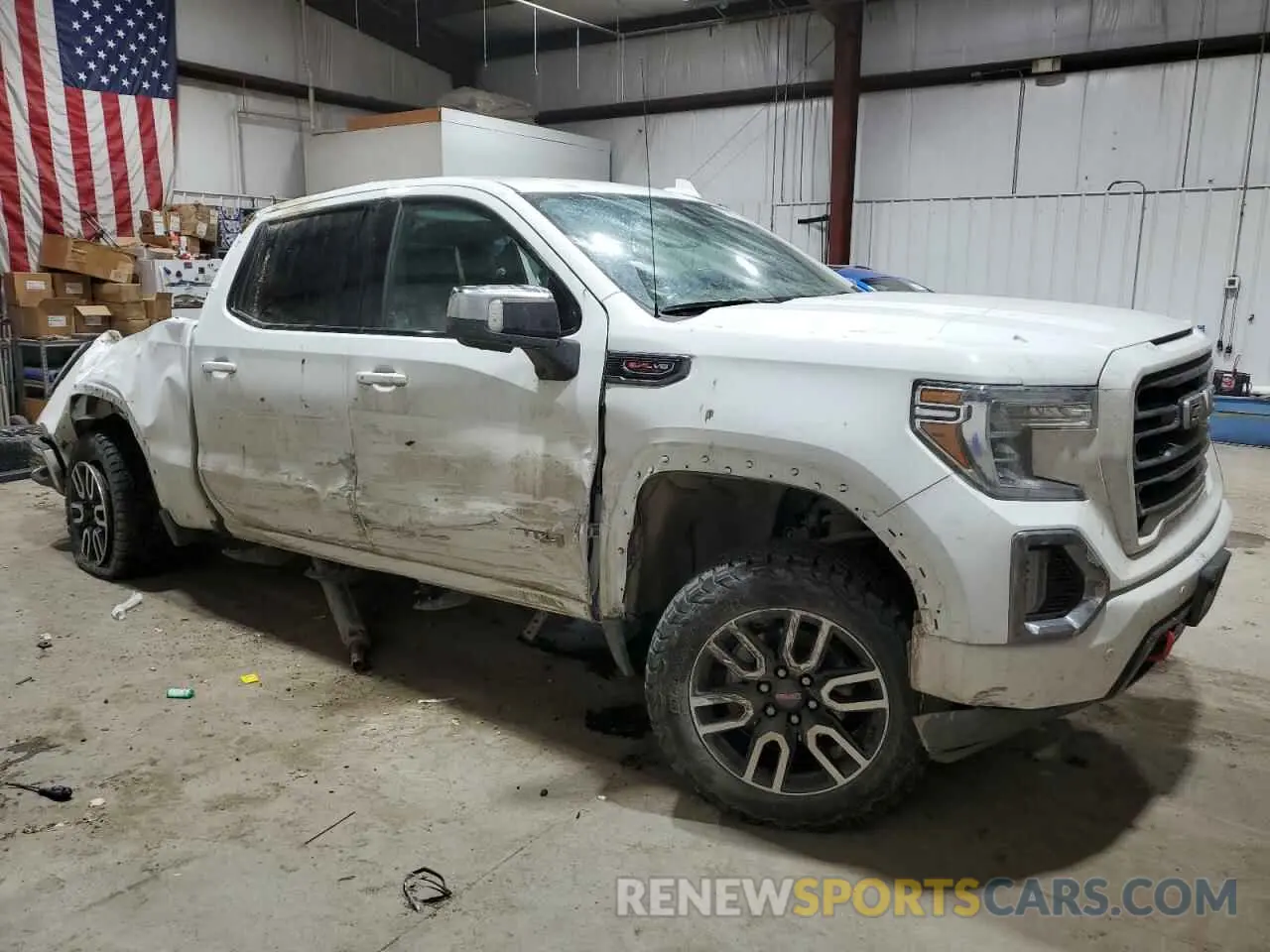 4 Photograph of a damaged car 1GTP9EELXKZ177710 GMC SIERRA 2019