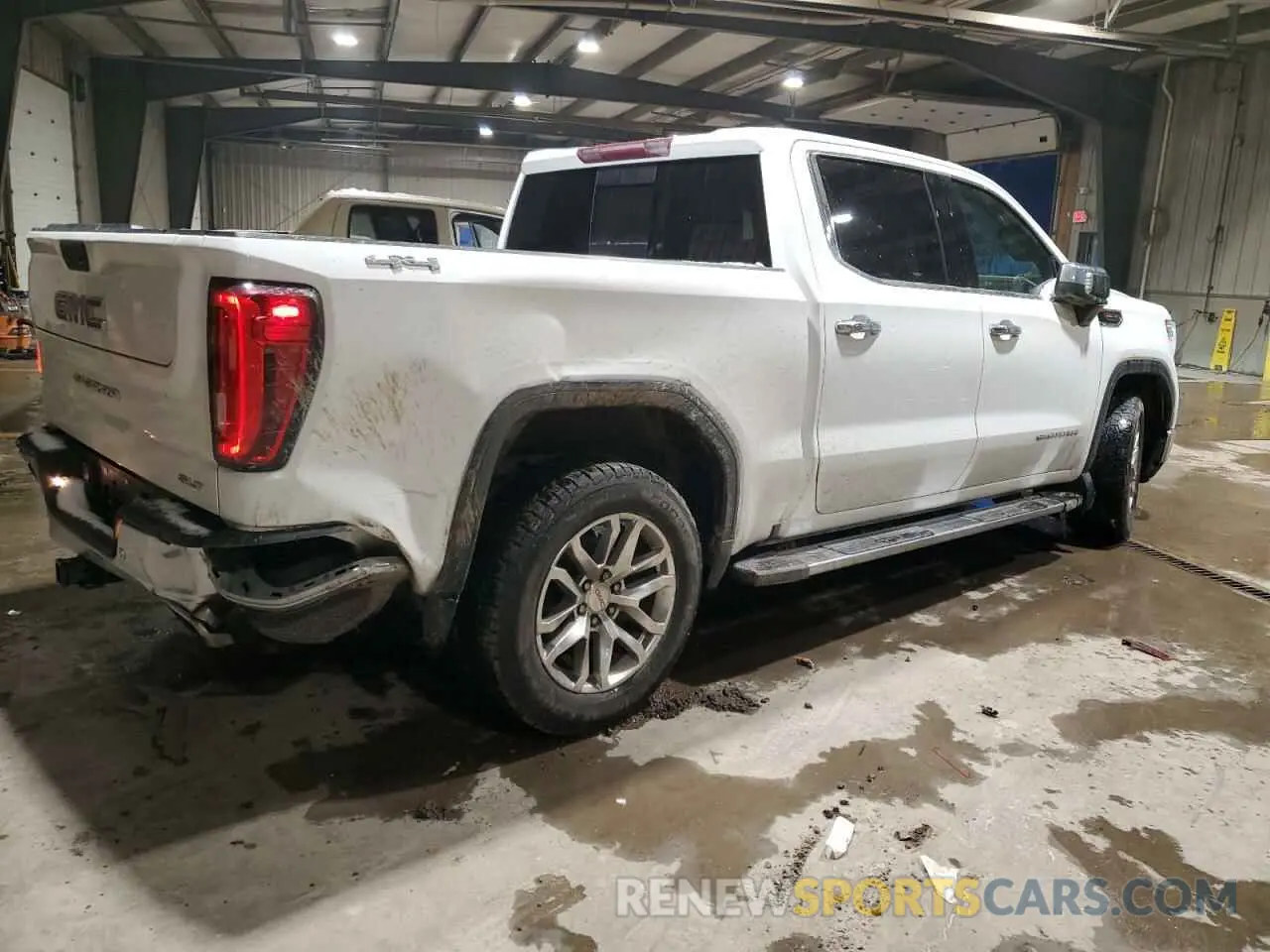 3 Photograph of a damaged car 1GTU9DEL0KZ222909 GMC SIERRA 2019