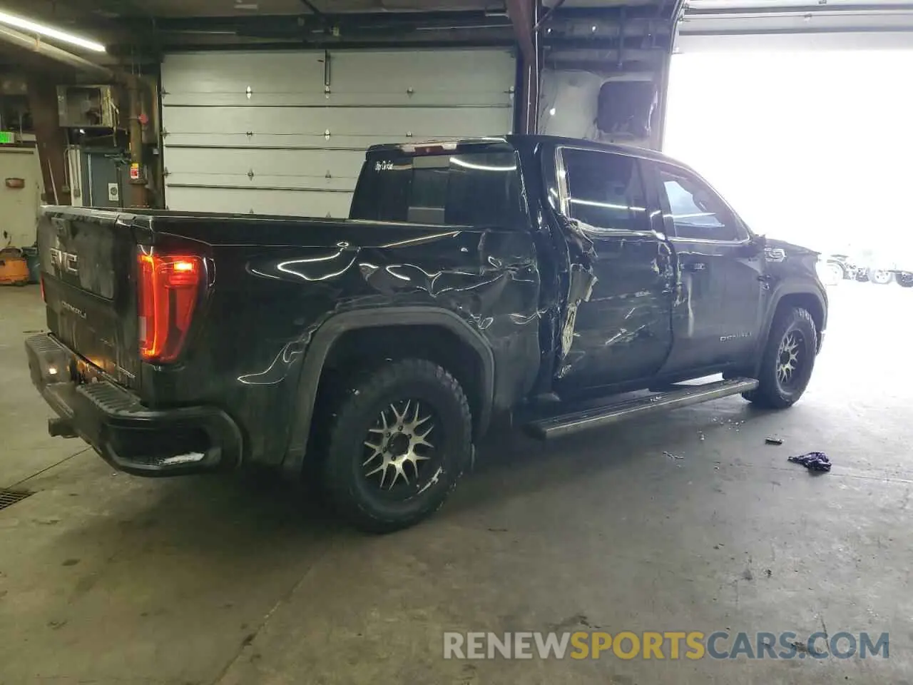 3 Photograph of a damaged car 1GTU9FEL3KZ108897 GMC SIERRA 2019