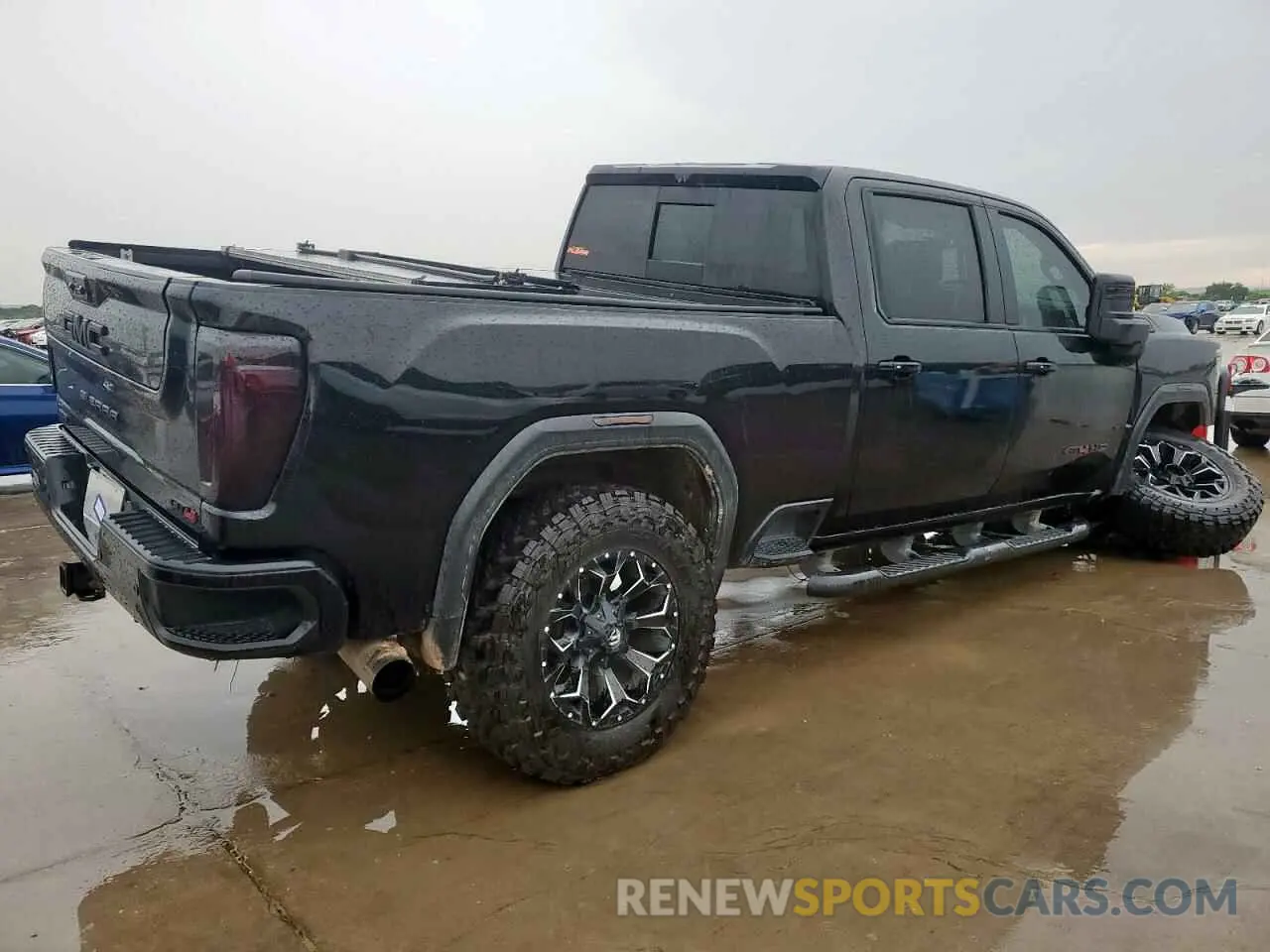 3 Photograph of a damaged car 1GT49PEY3LF205196 GMC SIERRA 2020