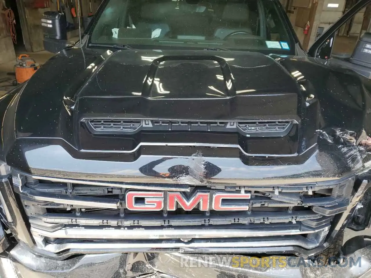 11 Photograph of a damaged car 1GT49PEY7LF135671 GMC SIERRA 2020