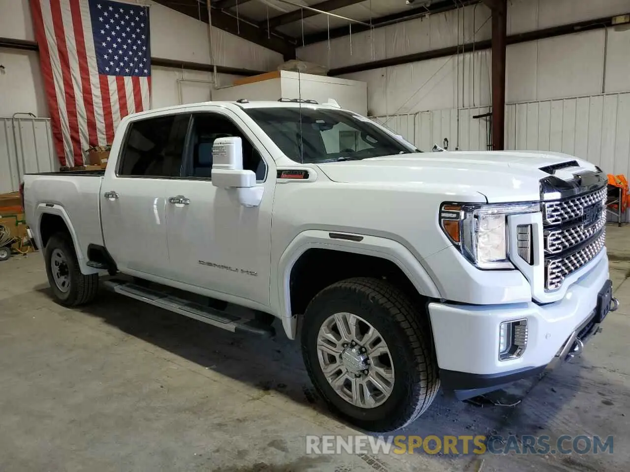 4 Photograph of a damaged car 1GT49REY3LF107118 GMC SIERRA 2020
