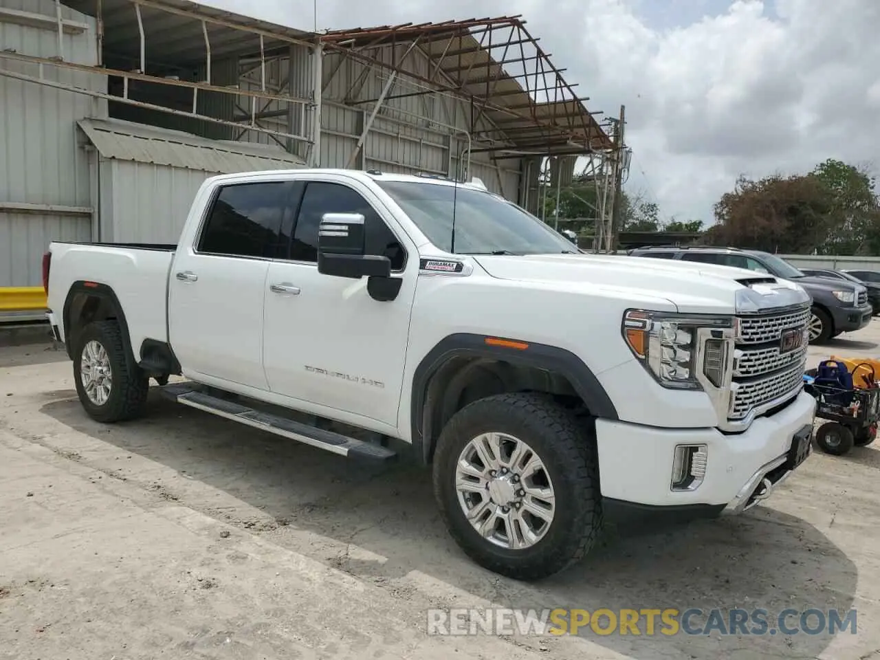 4 Photograph of a damaged car 1GT49REY5LF210606 GMC SIERRA 2020