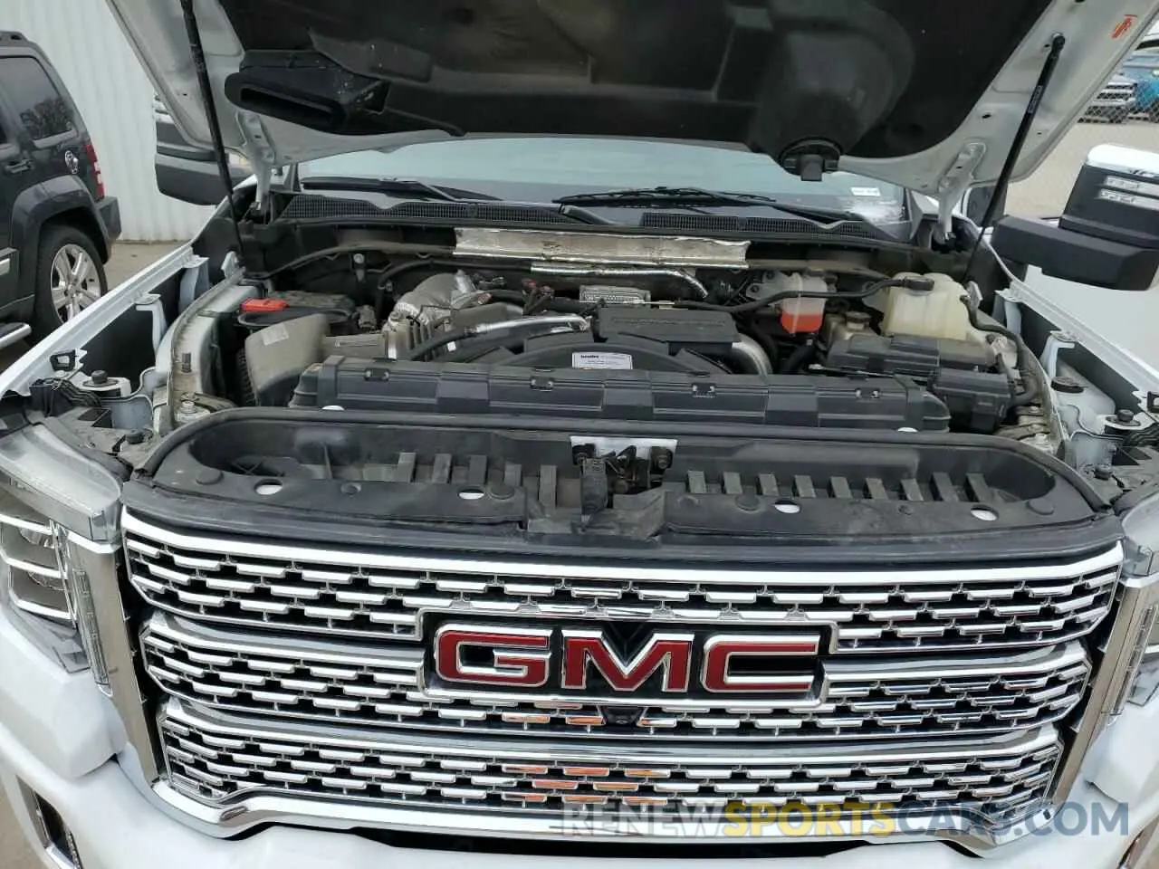 11 Photograph of a damaged car 1GT49REYXLF232133 GMC SIERRA 2020