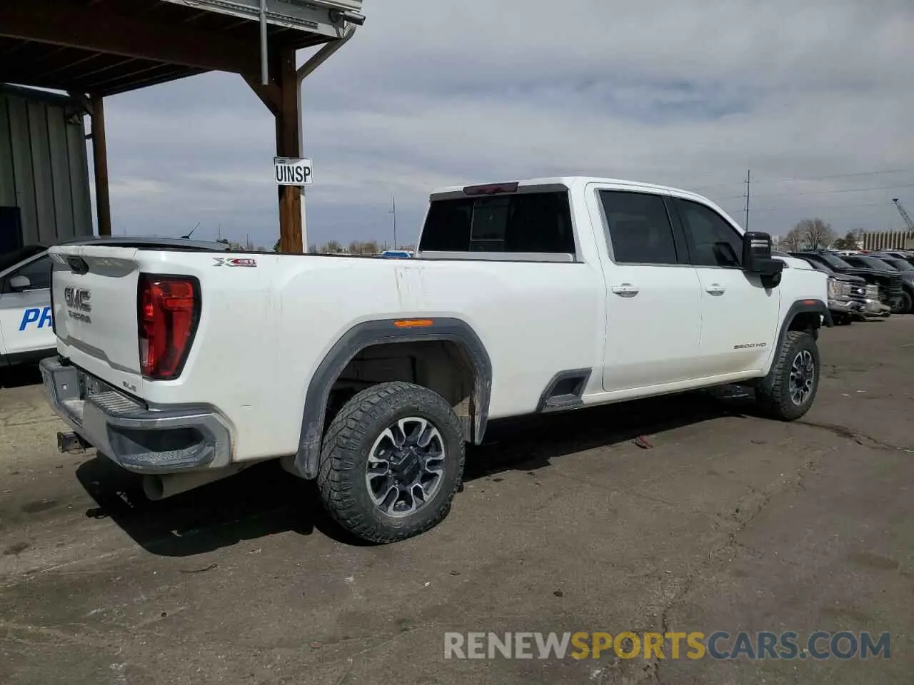 3 Photograph of a damaged car 1GT49TEY3LF217048 GMC SIERRA 2020