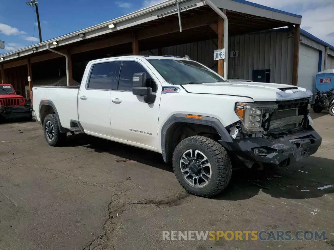 4 Photograph of a damaged car 1GT49TEY3LF217048 GMC SIERRA 2020
