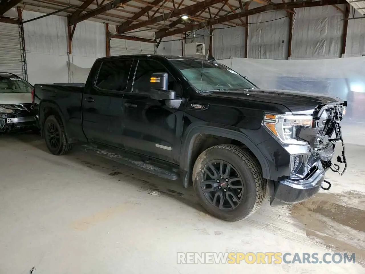 4 Photograph of a damaged car 1GTU9CET3LZ374100 GMC SIERRA 2020