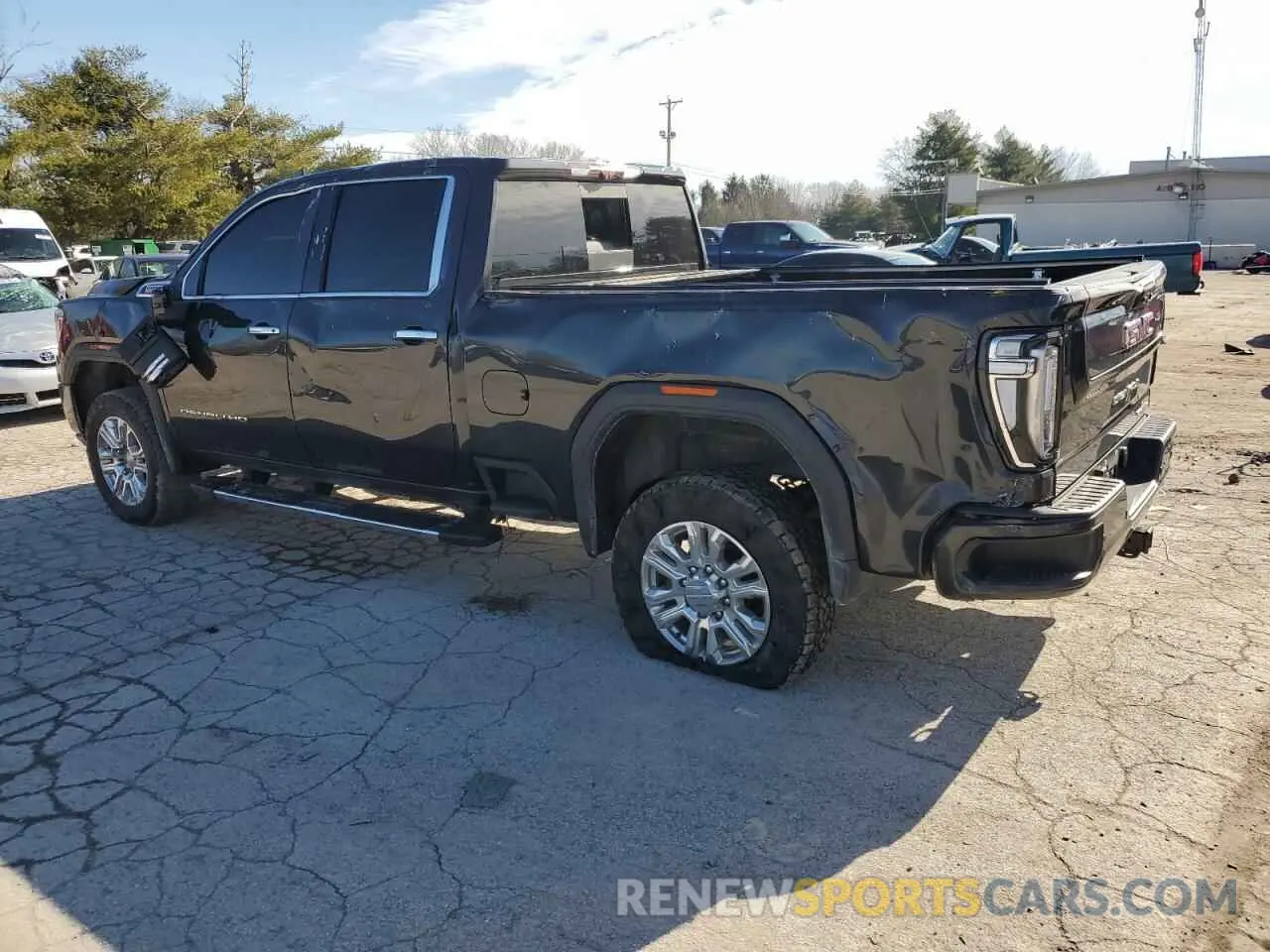 2 Photograph of a damaged car 1GT49REY8MF122313 GMC SIERRA 2021