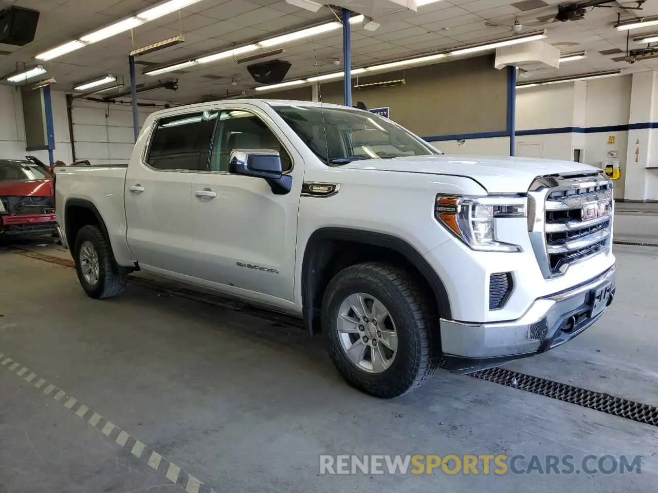 4 Photograph of a damaged car 1GTU9BET8MZ315605 GMC SIERRA 2021