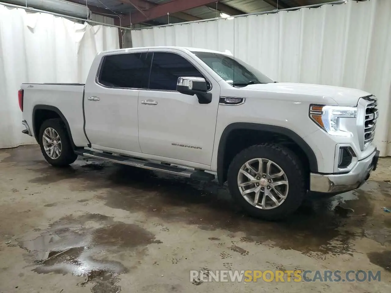 4 Photograph of a damaged car 3GTU9DET6MG362918 GMC SIERRA 2021